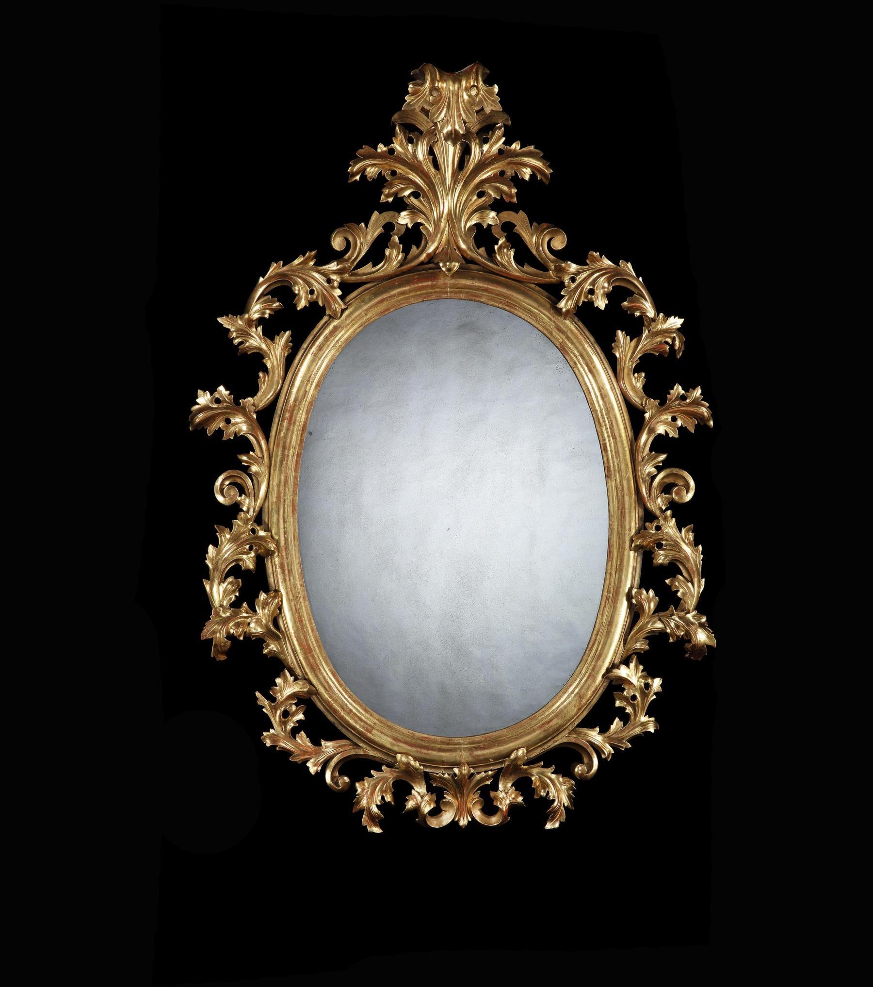 Grand Scale Pair of 19th Century Oval Florentine Carved Giltwood Mirrors  In Good Condition In Benington, Herts