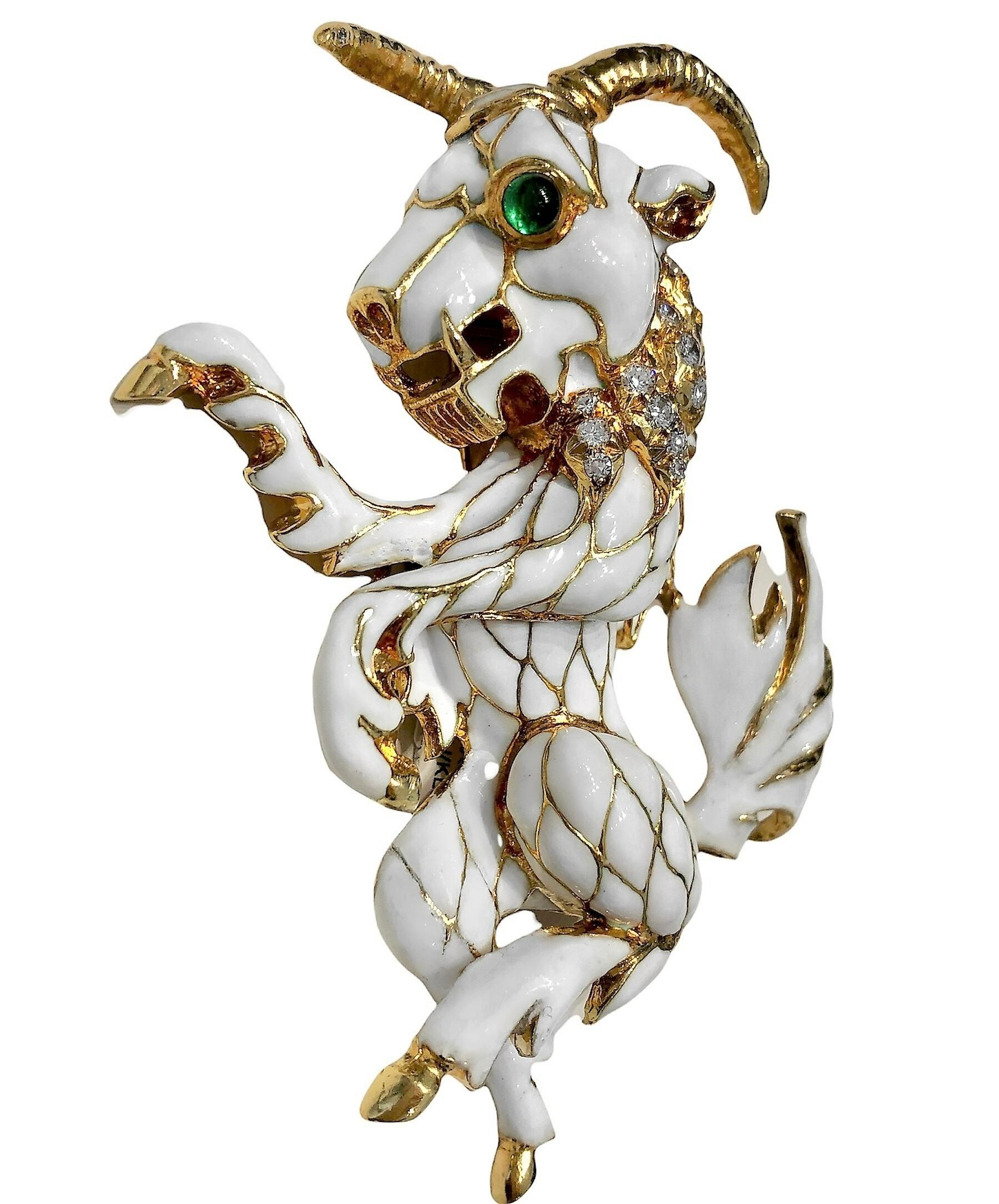 This highly articulated and very large Pan characterization brooch is finely crafted and covered over most of its surface with luxurious white cloisonne enamel. Bezel set are two emerald cabochon eyes, and seventeen brilliant cut diamonds grace the