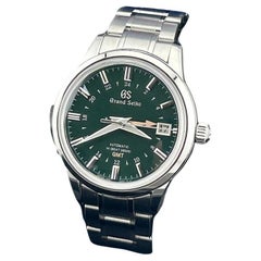 Grand Seiko Elegance Collection SBGJ251 Hi-Beat 36000 GMT Green Dial Steel Paper