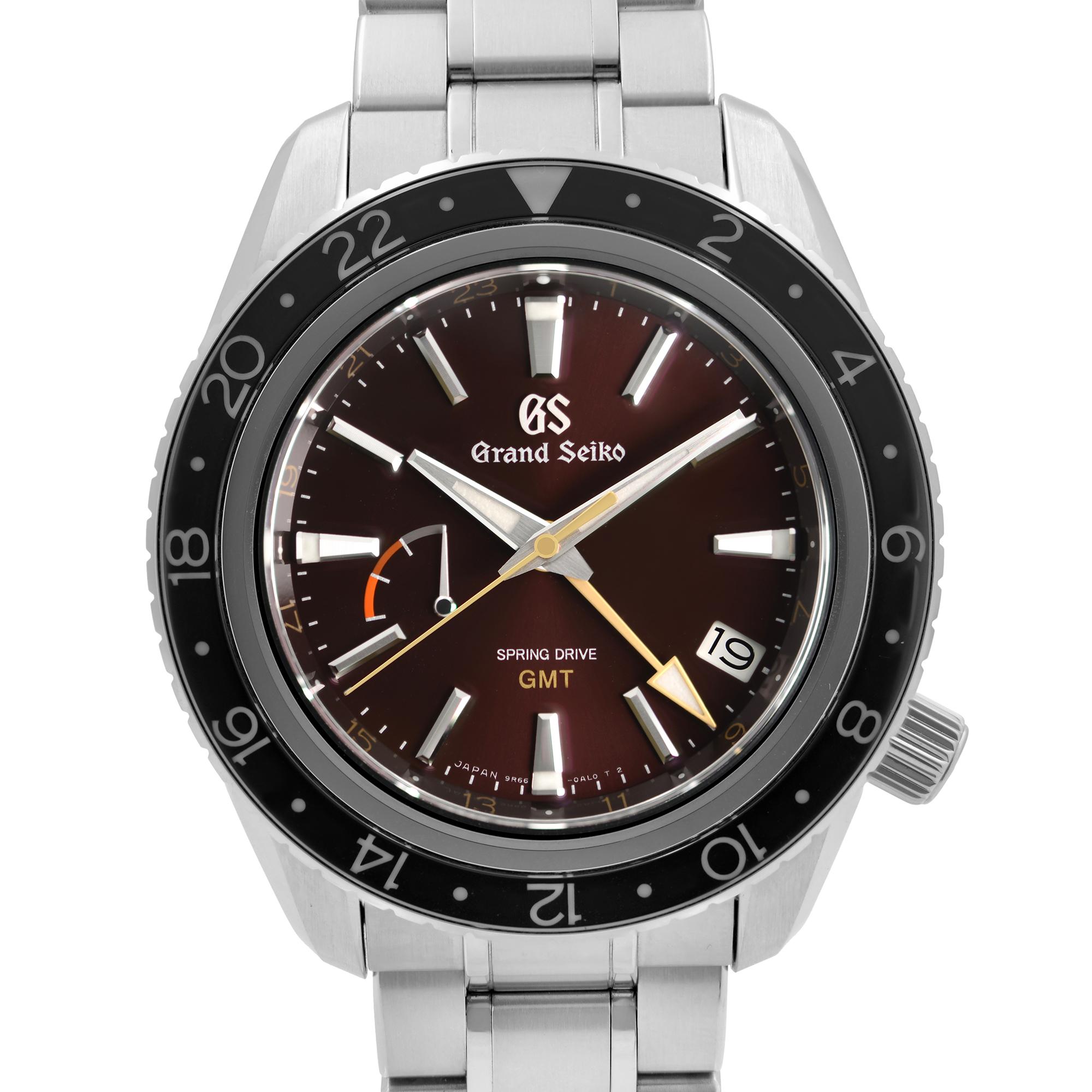 Display Model Grand Seiko GMT Steel Limited Edition Burgundy Dial Spring Drive Watch SBGE245. Limited edition to 600 Pcs. This is Edition No-051 out of 600. This Beautiful Timepiece is Powered by Spring Dive (Automatic) Movement And Features: Round
