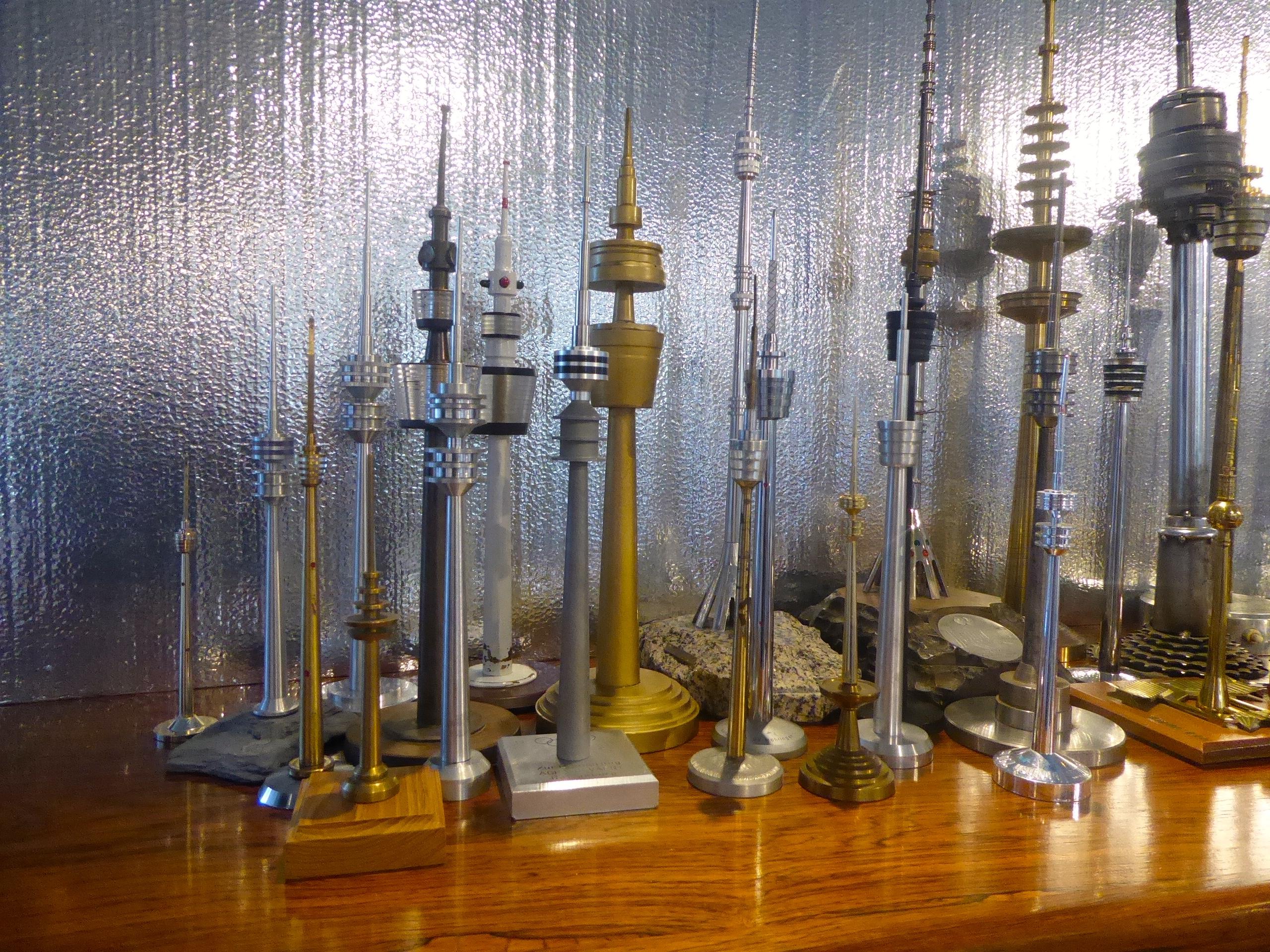 A grand set of 50 vintage European midcentury transmission tower replicas, circa 1950s-1980s. Many of these were handmade by engineering students to prove their skills on the lathe, using various materials like steel, aluminum, bronze, brass and