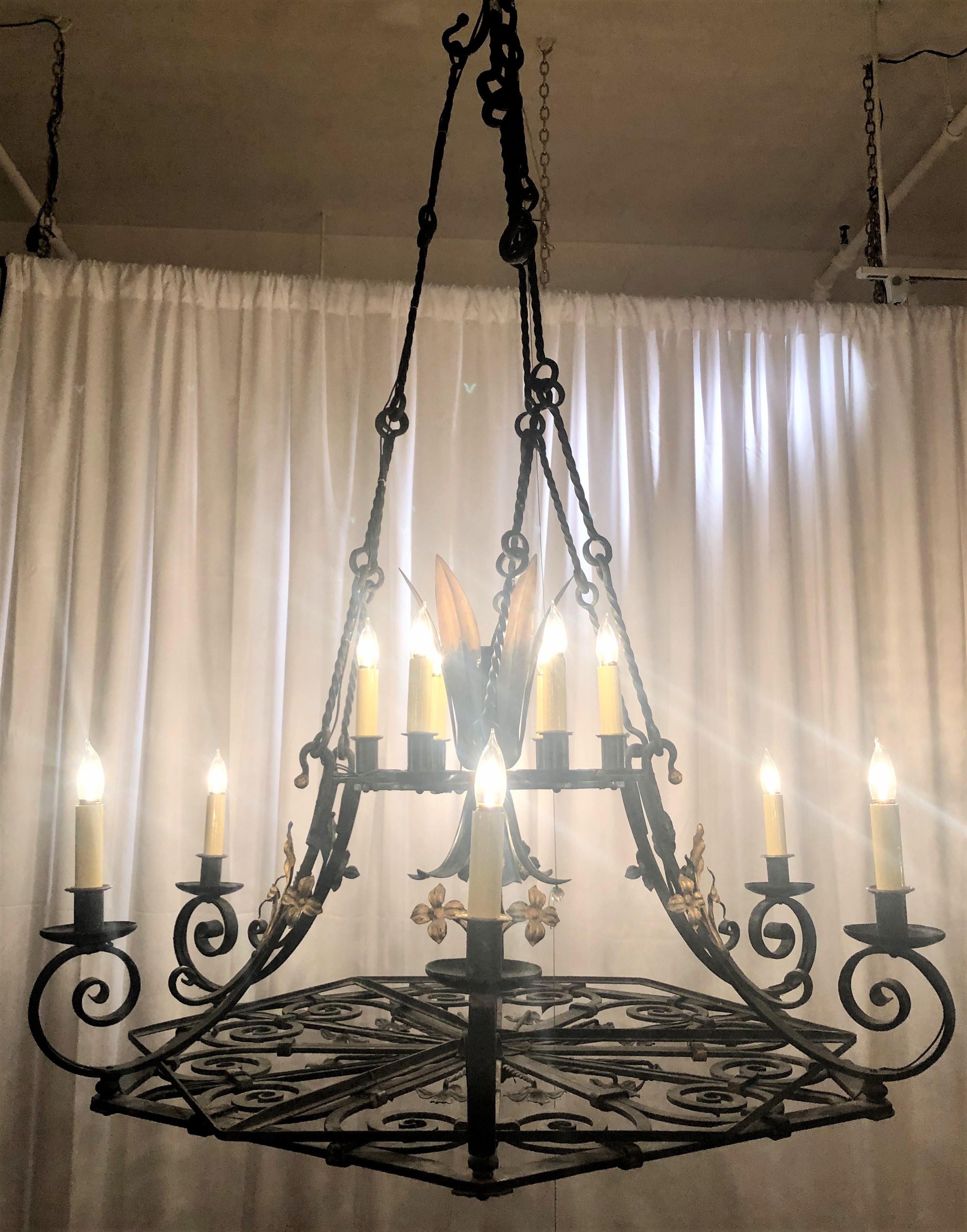 Grand size antique French wrought iron chateau chandelier, circa 1840.
      