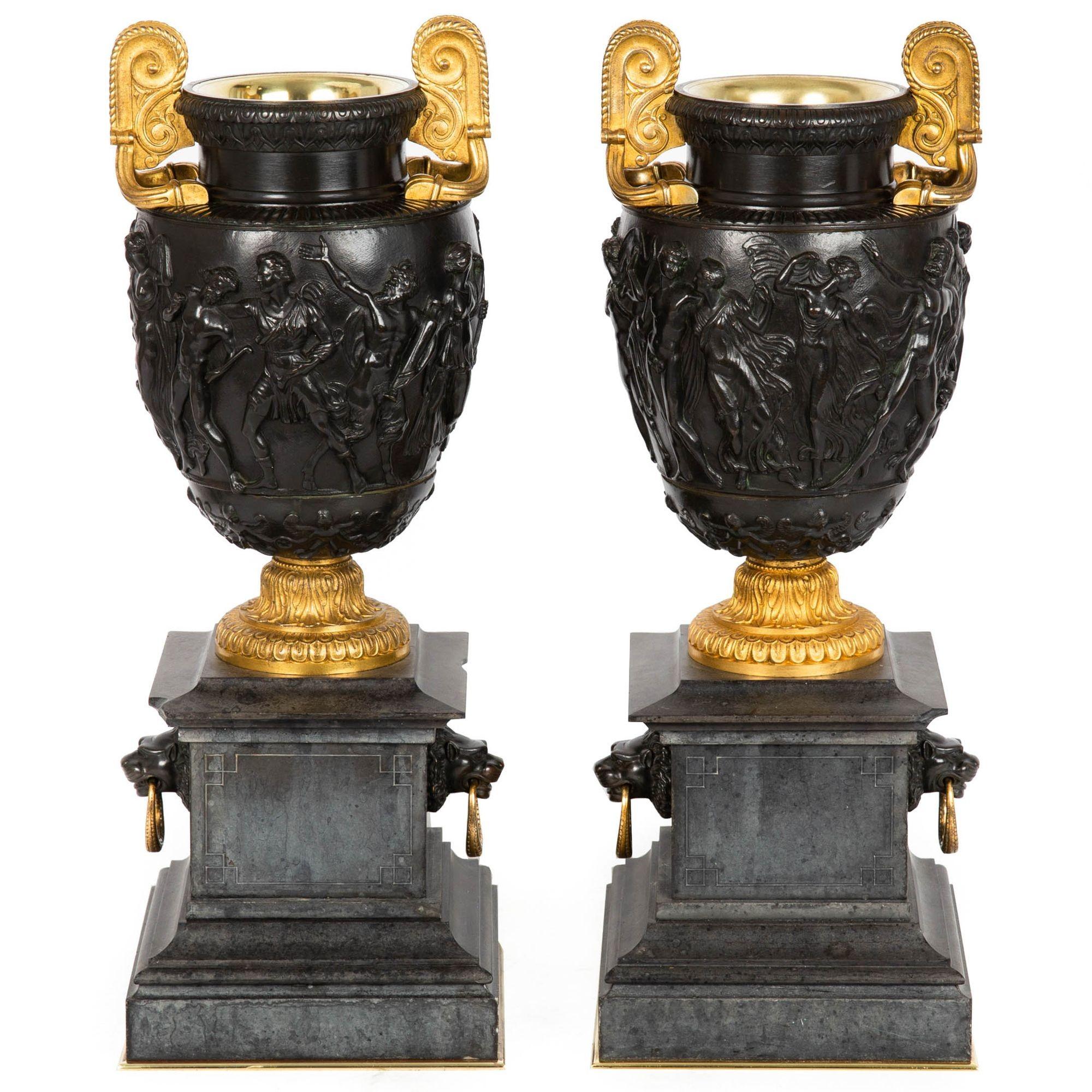 This very fine pair of gilt and patinated bronze vases are modeled after the Townley Vase. The 200 A.D. Roman copy of an earlier Greek example was discovered in 1773 by Gavin Hamilton and was owned by Charles Townley, from whom the name of the vase