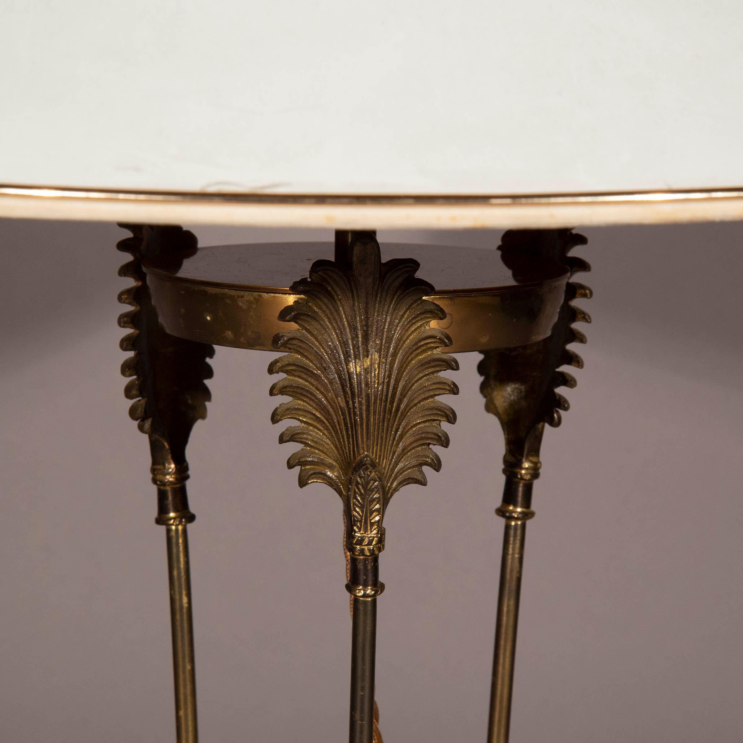 An unusual bronze 'Athénienne' table lamp in the Grand Tour taste. 20th century.

Why we like it

Formed of three arrows, this design derives from the sacrificial tripods, later known as athéniennes that were used in ancient Greece and Rome, the