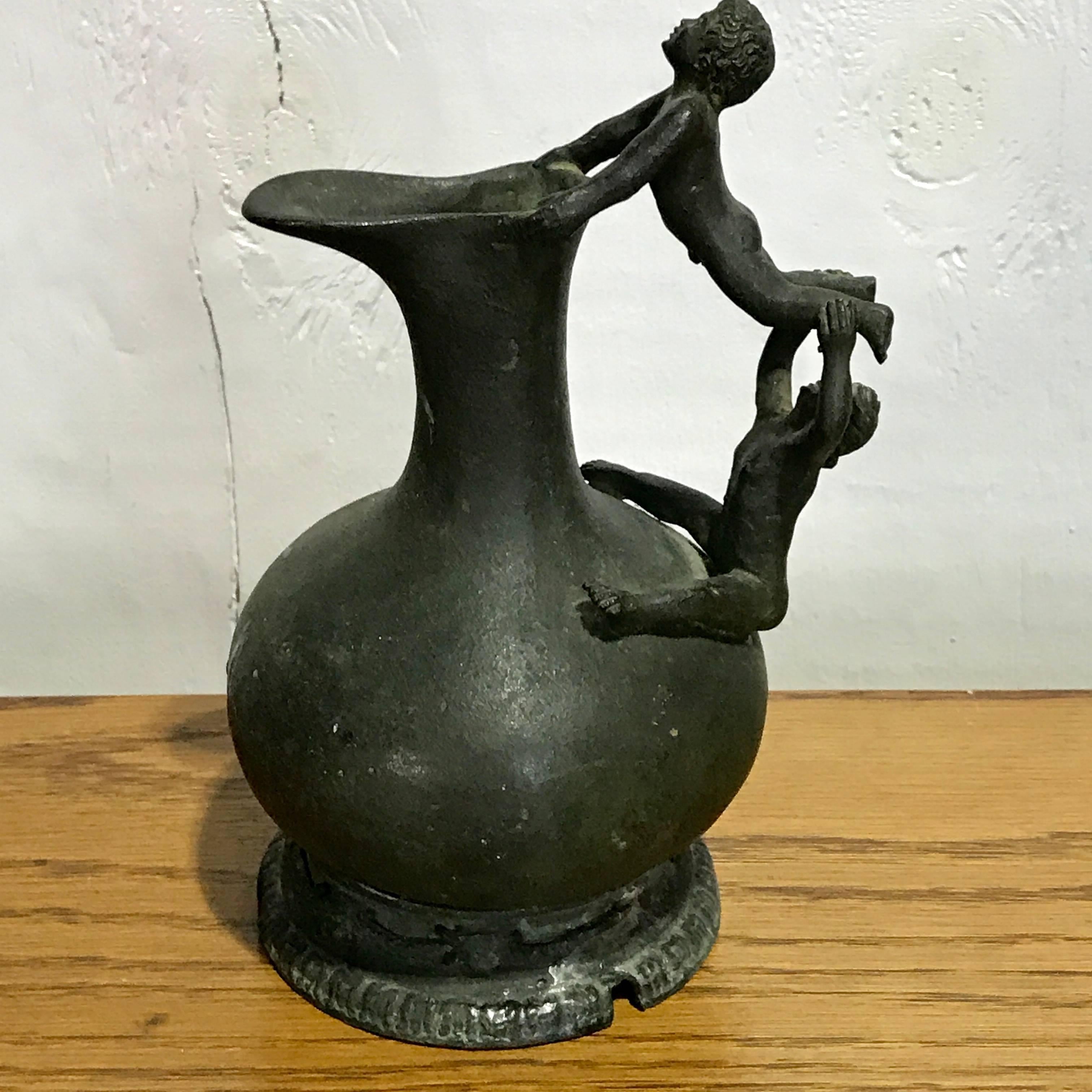Patiné Grand Tour Bronze Figural Ewer and Stand, after the Roman Antique en vente