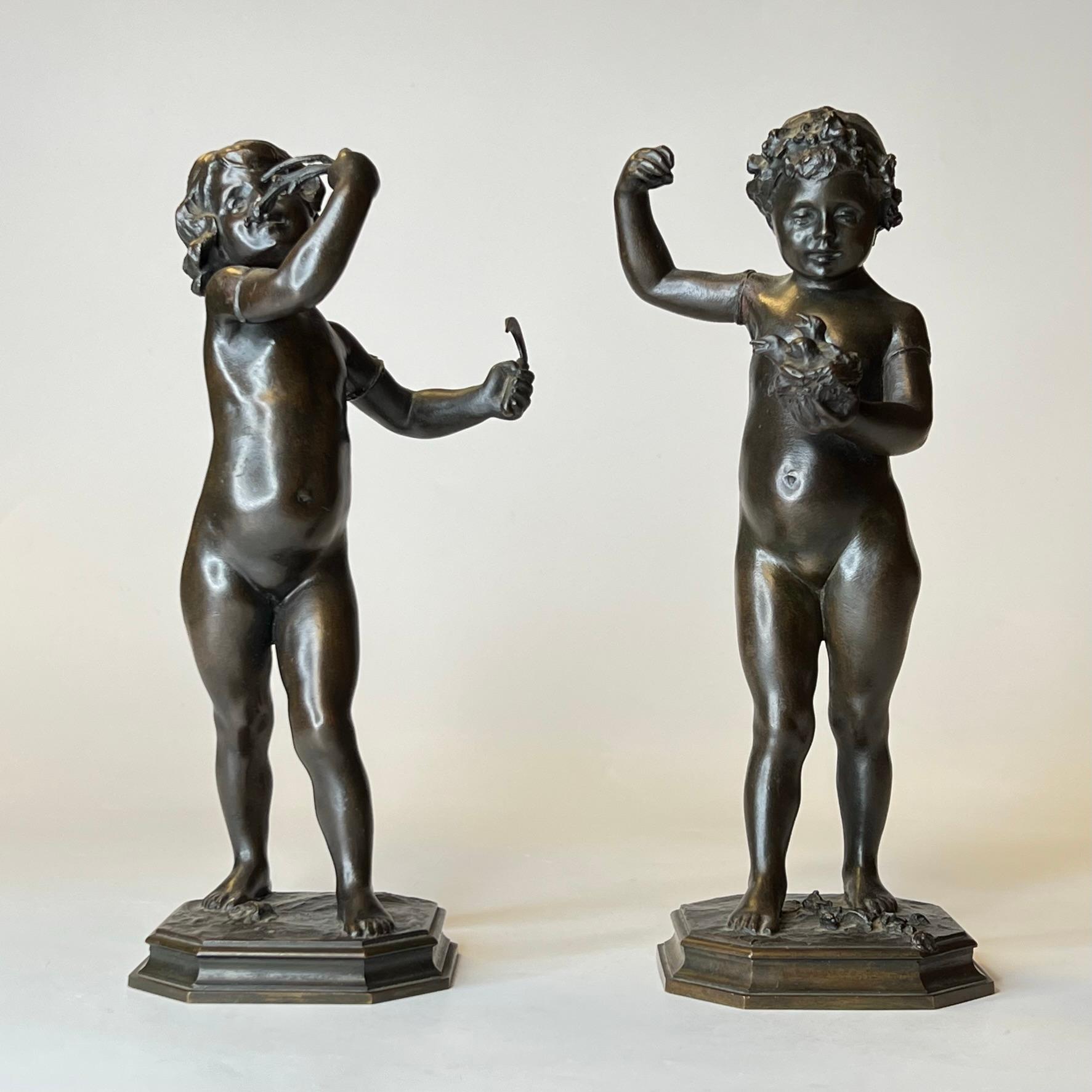 Pair of Grand Tour bronze sculptures depicting playful boy and girl.  Apparently unsigned and each in good condition.