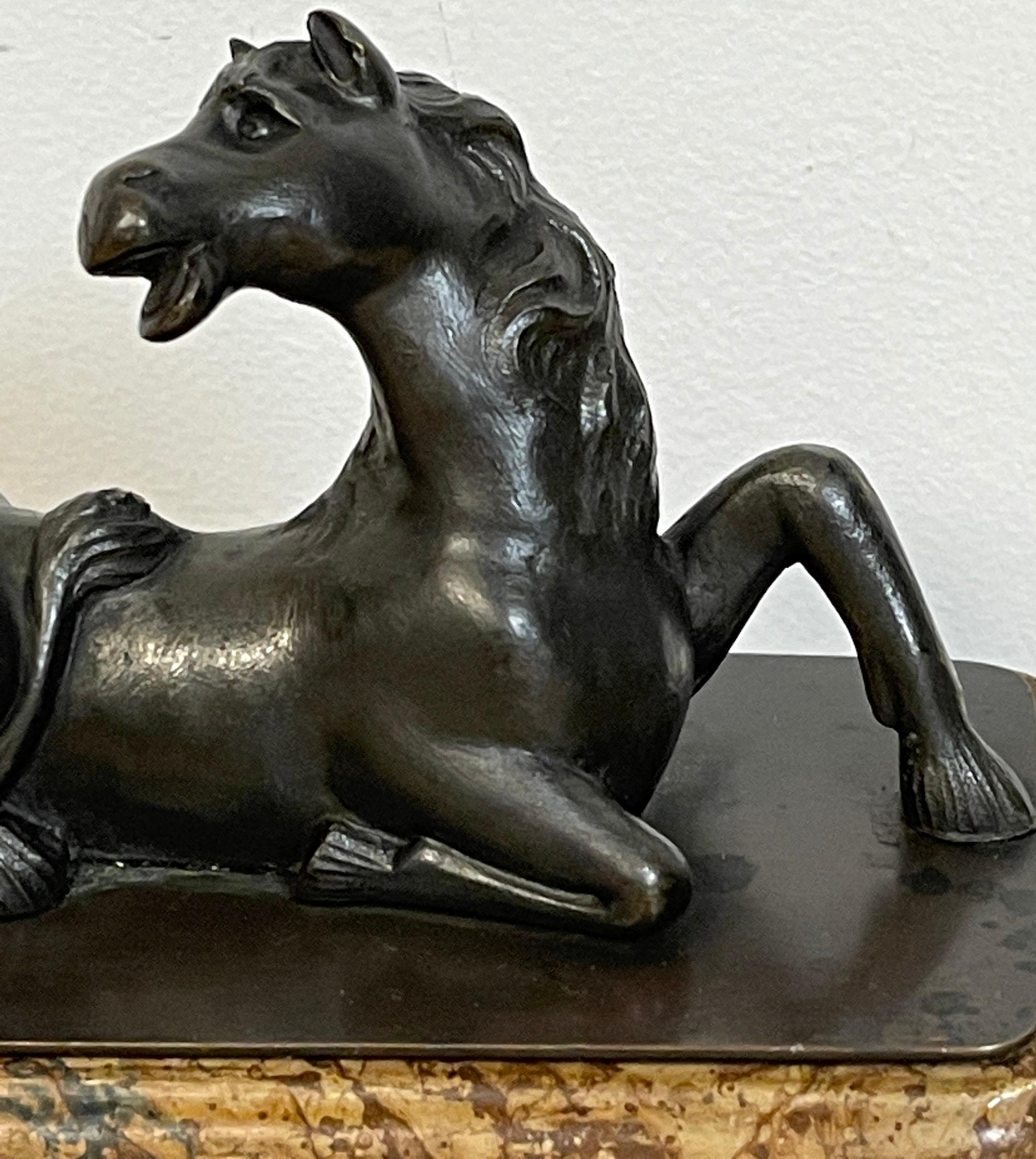 Patinated Grand Tour Bronze Model of a Recumbent Horse For Sale