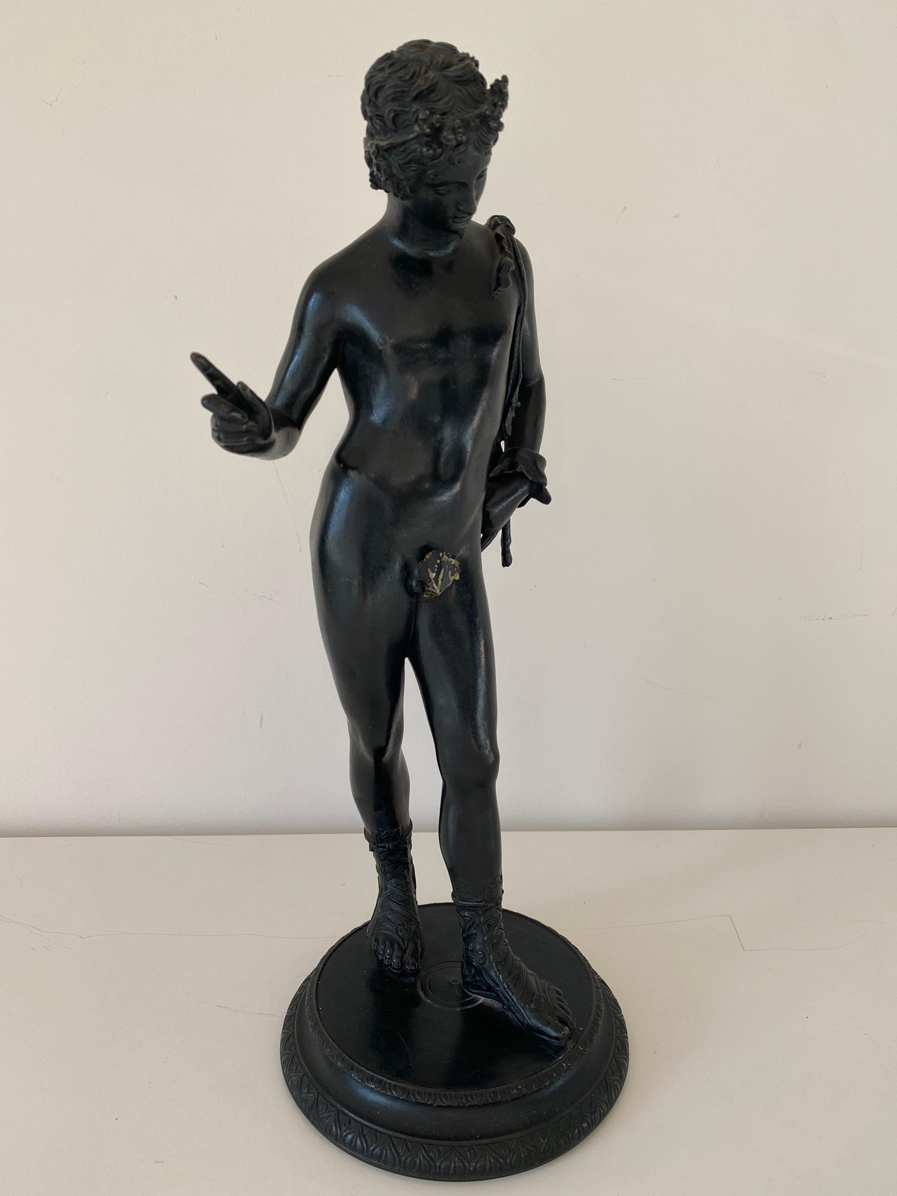 A 19th century Grand Tour bronze statue of Narcissus. Foundry mark Sommer Napoli engraved on circular plinth. Includes original Victorian era detachable fig leaf.