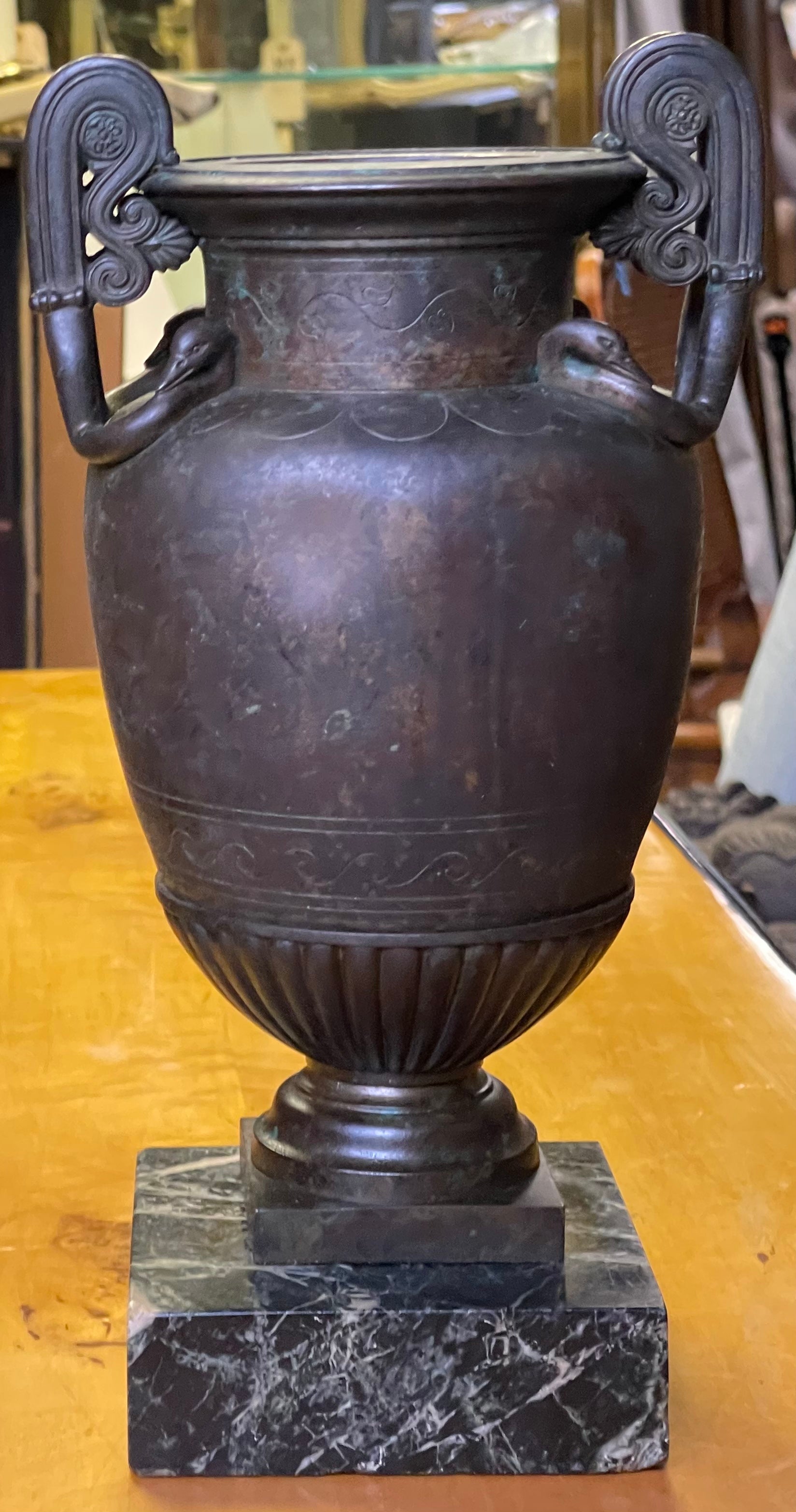 This is breathtaking! It is an early 19th century bronze volute krater by Benedetto Boschetti, a Roman artisan. It is marked. The marble base is 4.5” square. It is a stunning example of the bronze pieces completed and intended for the wealthy