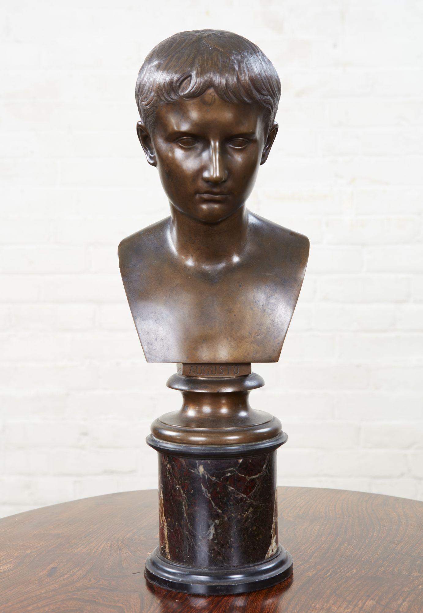 Italian 19th century bronze bust of Augustus Ceasar, finely detailed and well patinated, standing on turned ebonized wood and marble socle plinth base.