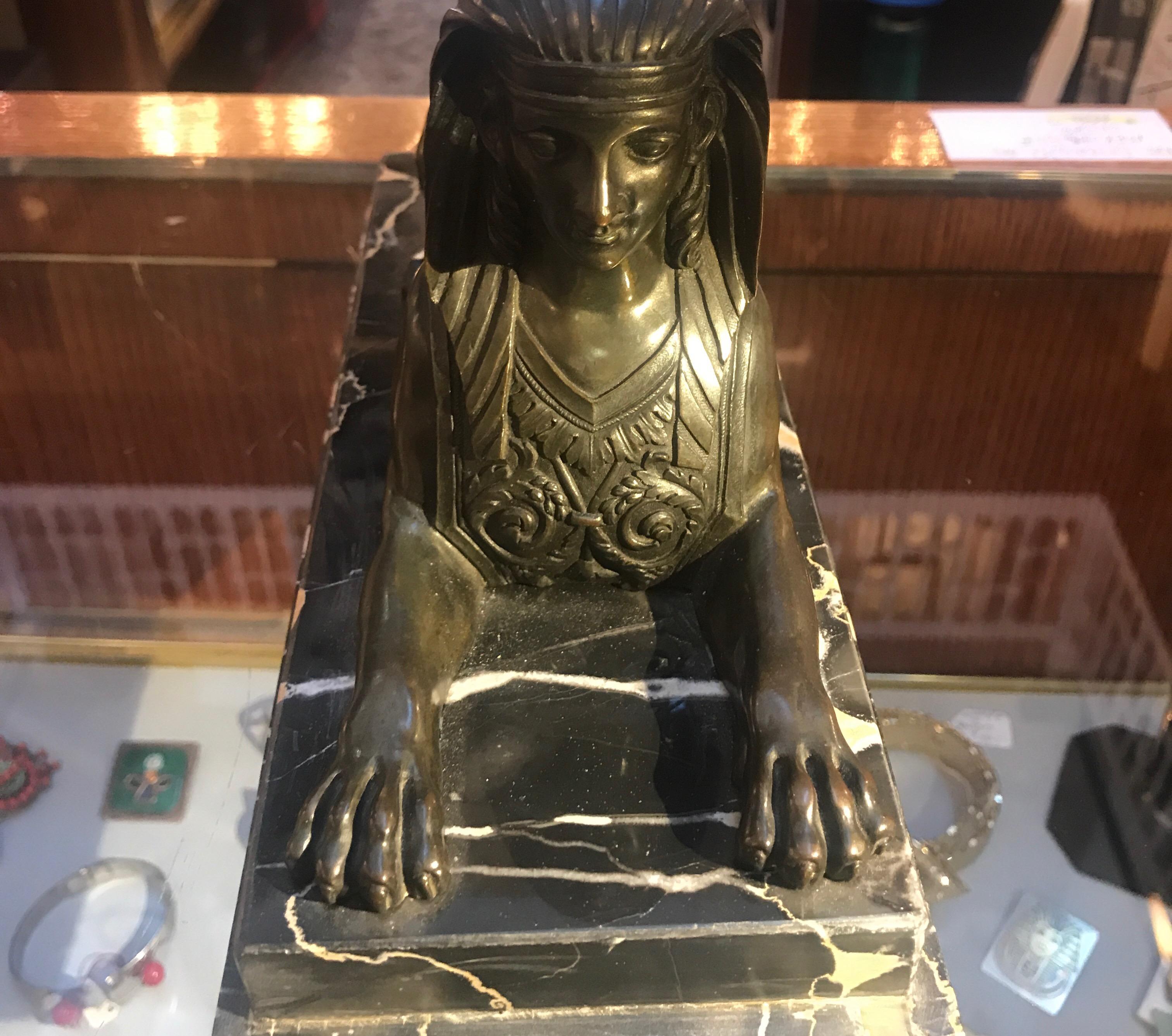 Stunning patinated bronze of sculpture sphinx. Beautifully cast bronze and patinated finish on an Italian Nero Portoro marble base, circa 1870s, Second Empire period.