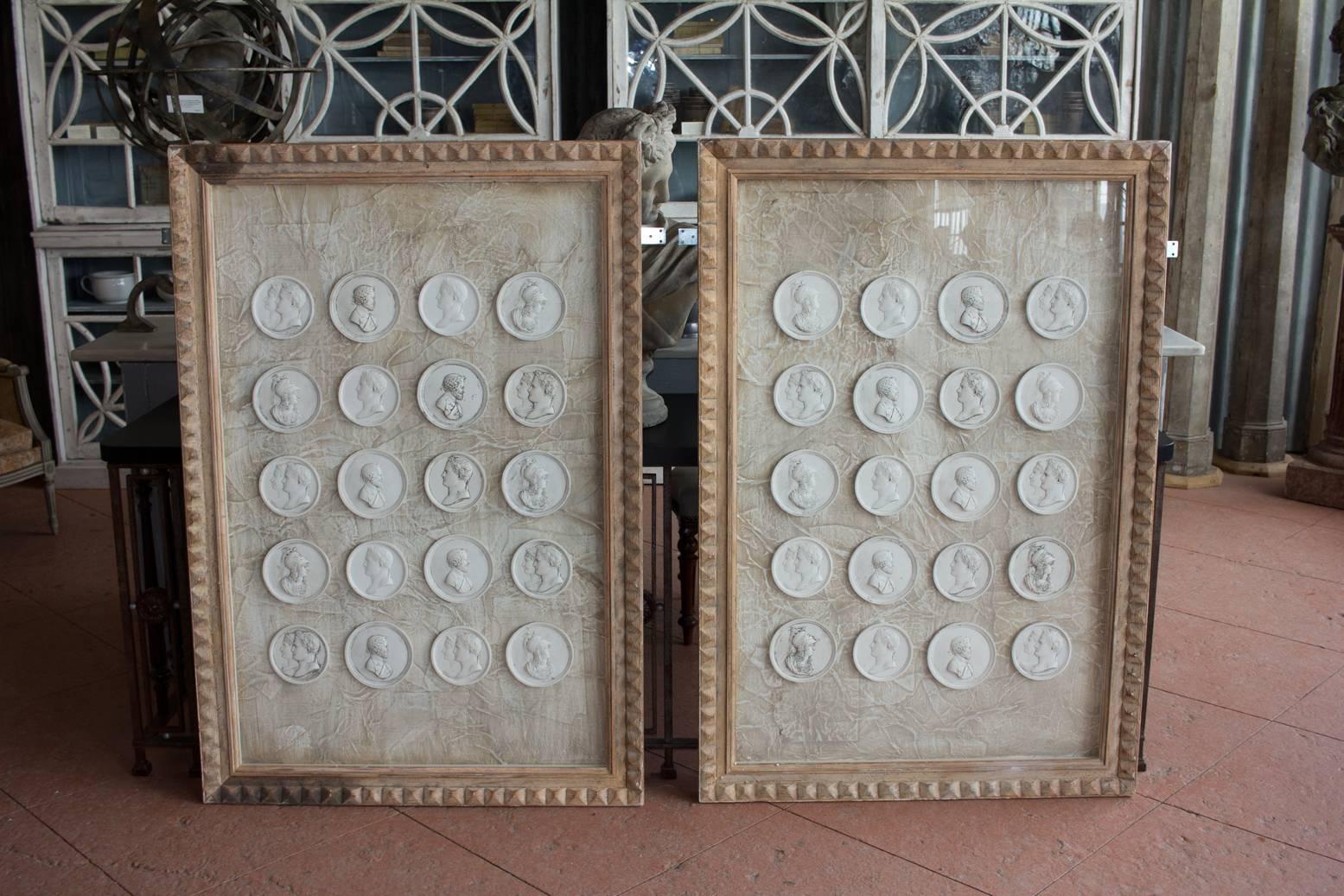 Twenty framed recast Grand Tour intaglios. The frame is made from antique Italian architrave and backed with original parchment that shows signs of early writing.

Two available.