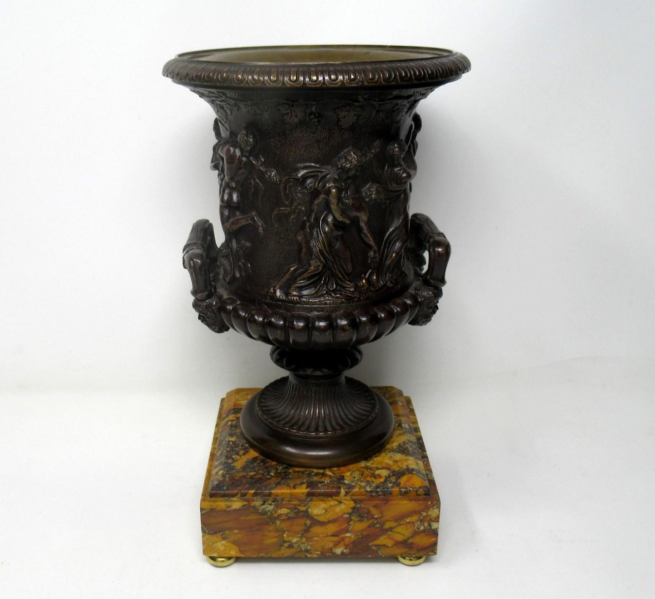 A fine and well cast example of an Italian grand tour patinated bronze relief cast model of the Medici twin handle vase, after the antique Bennedetto Boschetti Foundry, 74 Via Condotti, Rome, active 1820-1870, early to mid-19th century, raised on an