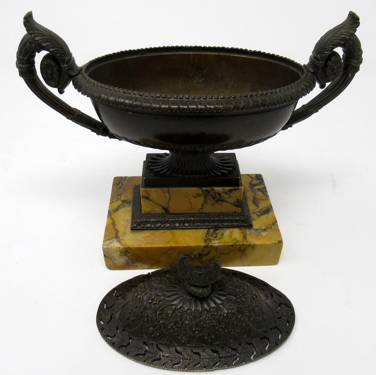 Superb French Grand Tour bronze urn-form potpourri of outstanding quality, complete with its original well veined bronze mounted Sienna Marble rectangular plain stepped two piece base. First quarter of the 19th century. 

The oval formed body with