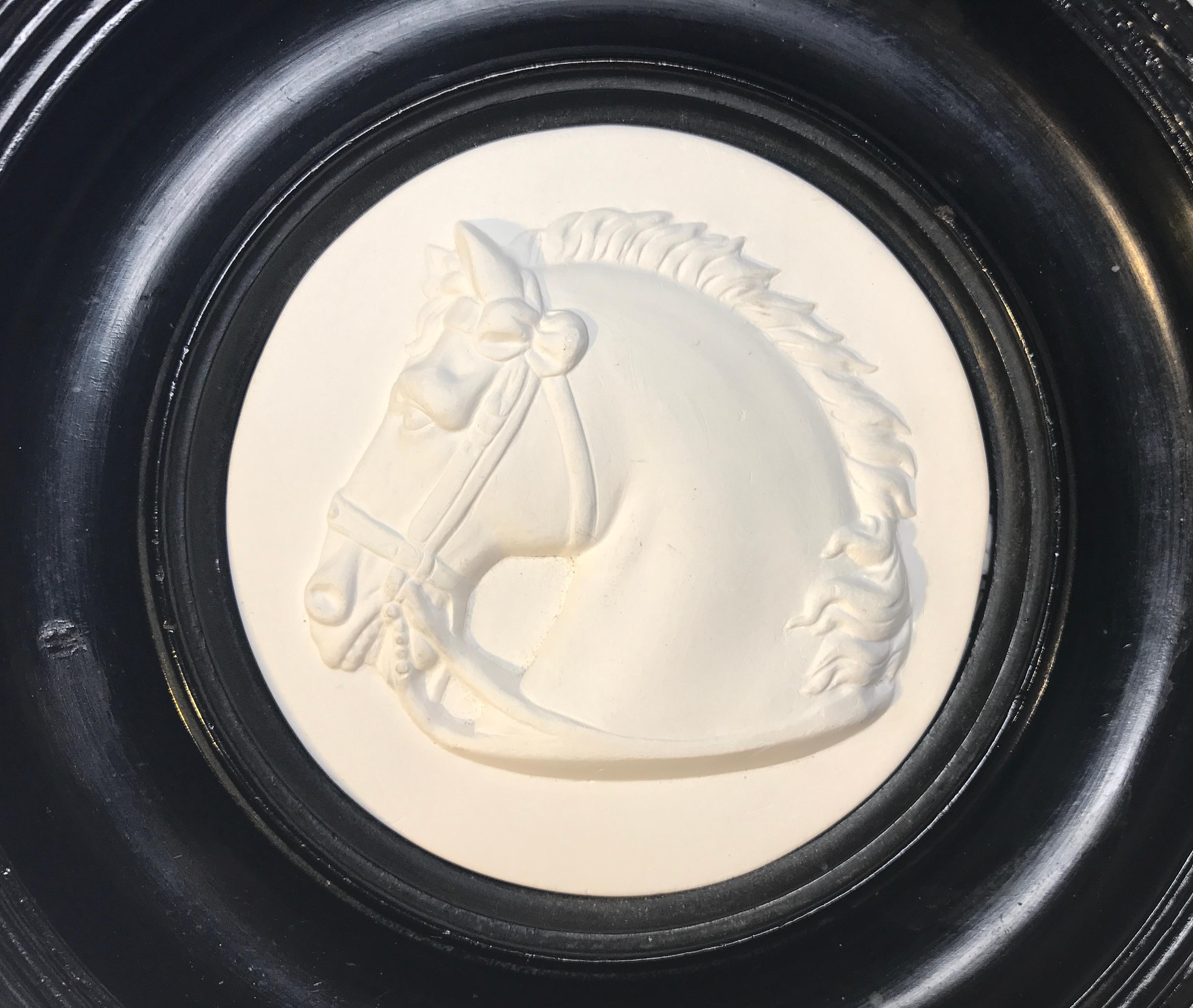 A superb 19th century Grand Tour framed plaster cameo, depicting a stallion's profile in bas-relief
antique Italian souvenir offering fine detailing and clean lines
ebonized round frame with hanging ring to back
Measures: Frame height 1.3 inch,