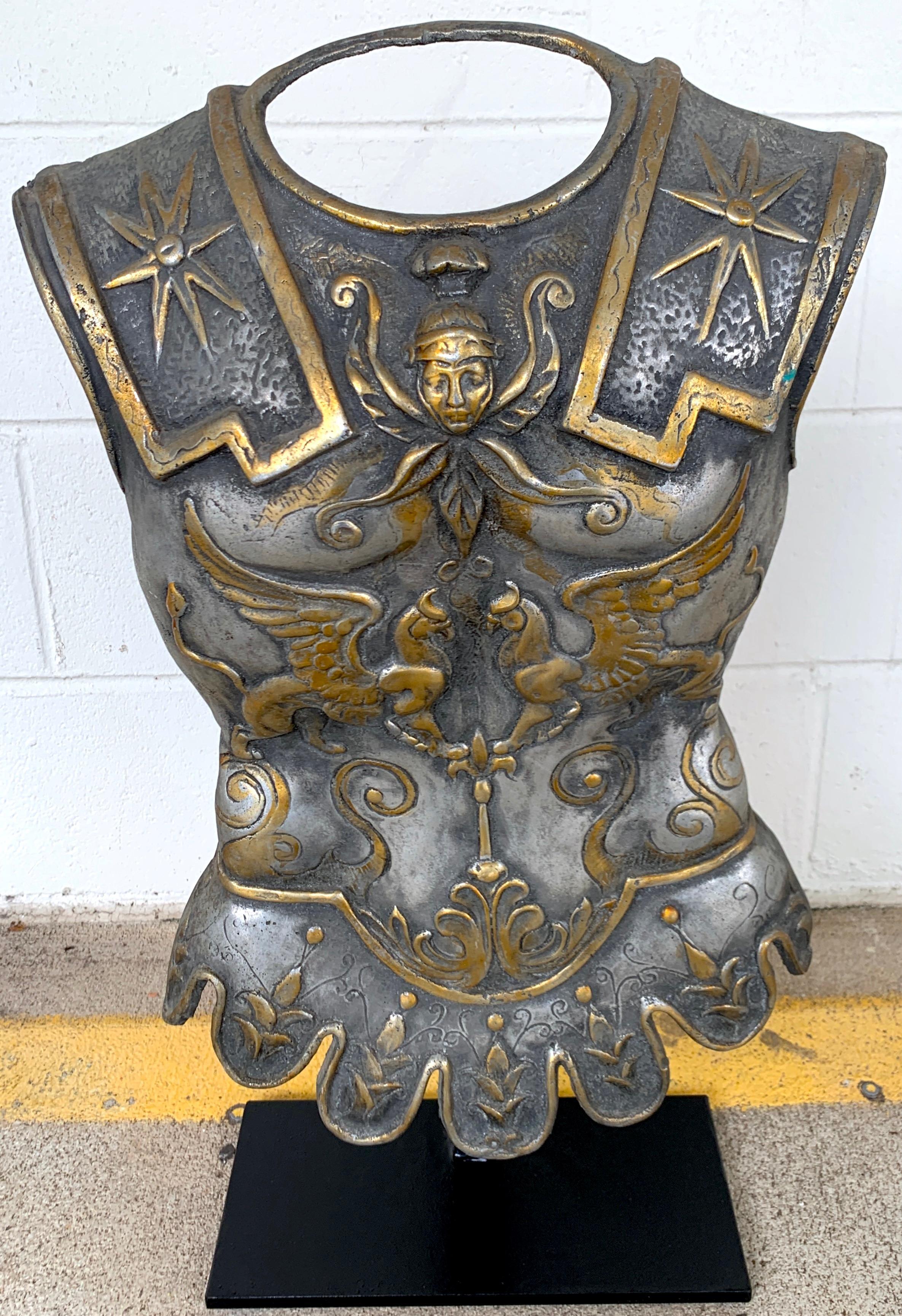 Grand tour model of a Roman breast plate, museum mounted
Realistically cast and modeled after the original, fine cast and gilt metal with 8 point stars, medallions, sphinxes and foliate decoration. Displayed on a custom iron stand 12