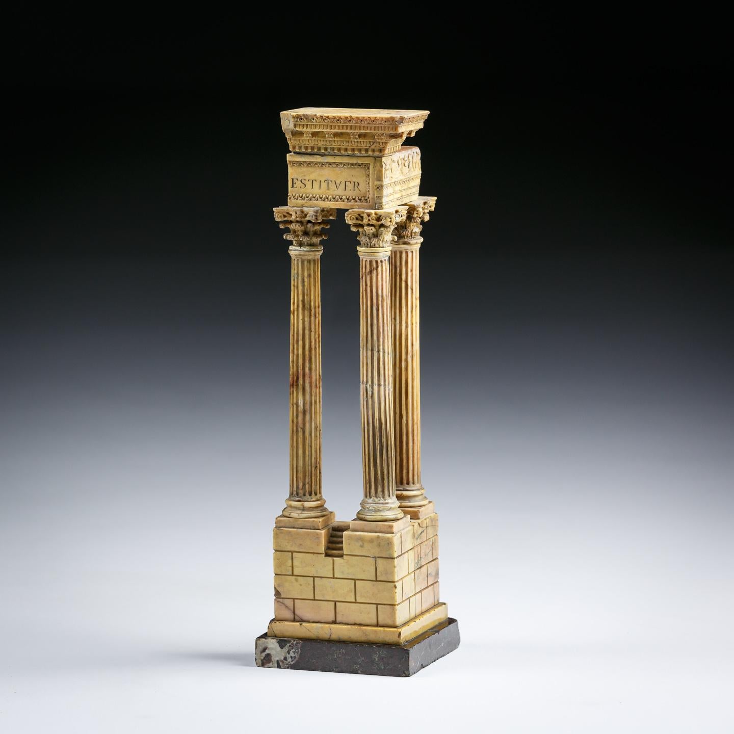 Exceptional quality grand tour Giallo Antico Marble model of The Temple of Vespasian. Vatican Workshops.
Minor blemishes and some restoration. Sound solid condition.
circa 1820.