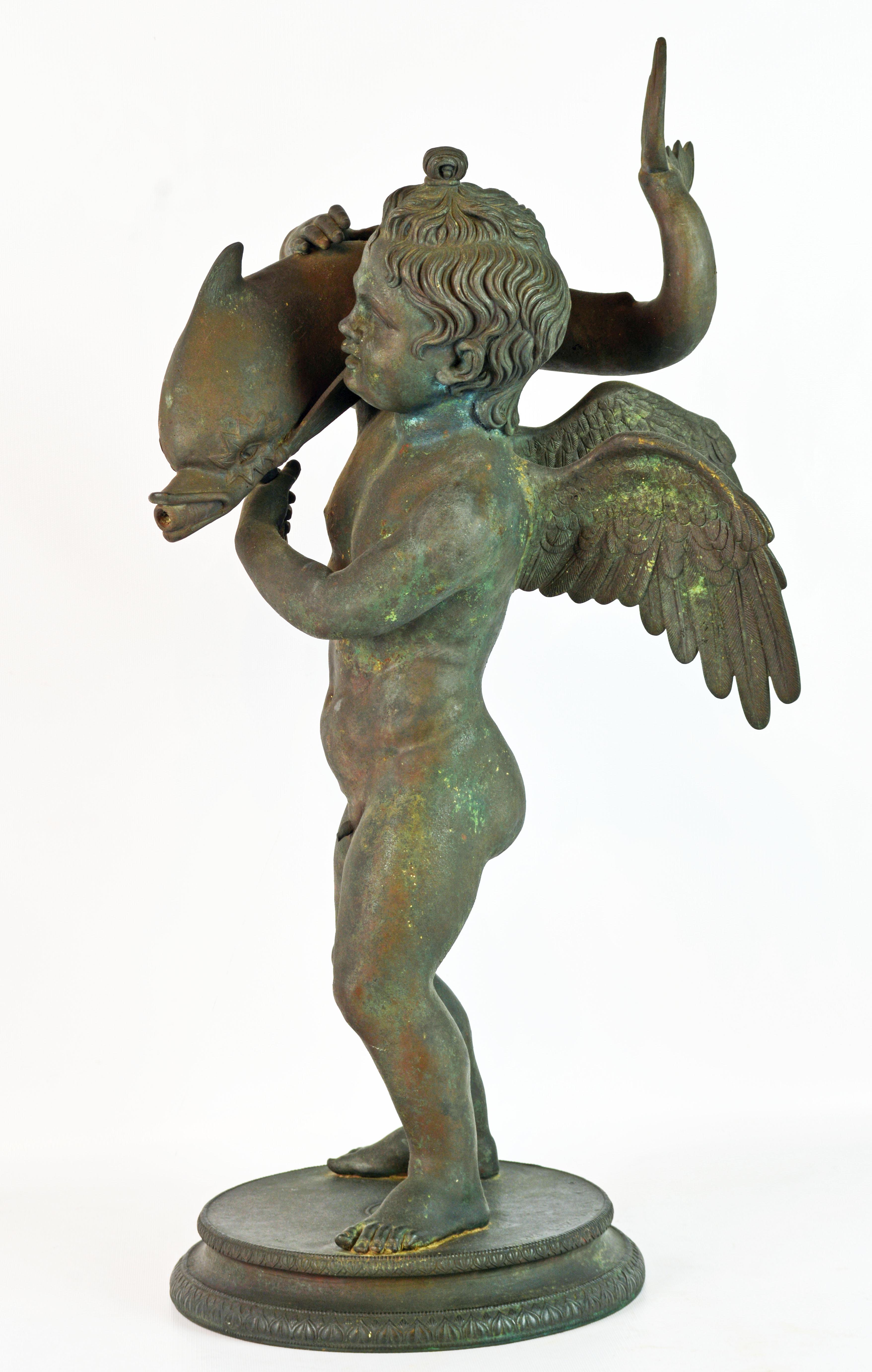 Rare and beautiful 19th century Neapolitan Grand Tour bronze fountainhead of the 'Amore con Delfino'. Cupid with dolphin, after the antique. Good large size version in dark 'archaeological verdi gris Pompean patination' after the original fountain