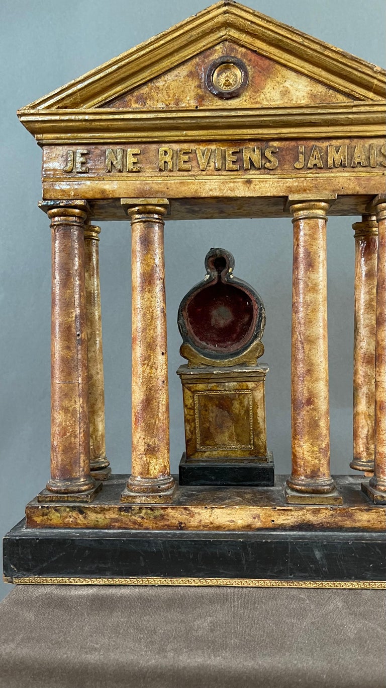 Beautiful and important wooden memorial temple covered in faux marble. 
From the purest neoclassical form, this Grand Tour piece of furniture is a classic piece of furniture of great prestige. 
It has a partially visible label on the back with