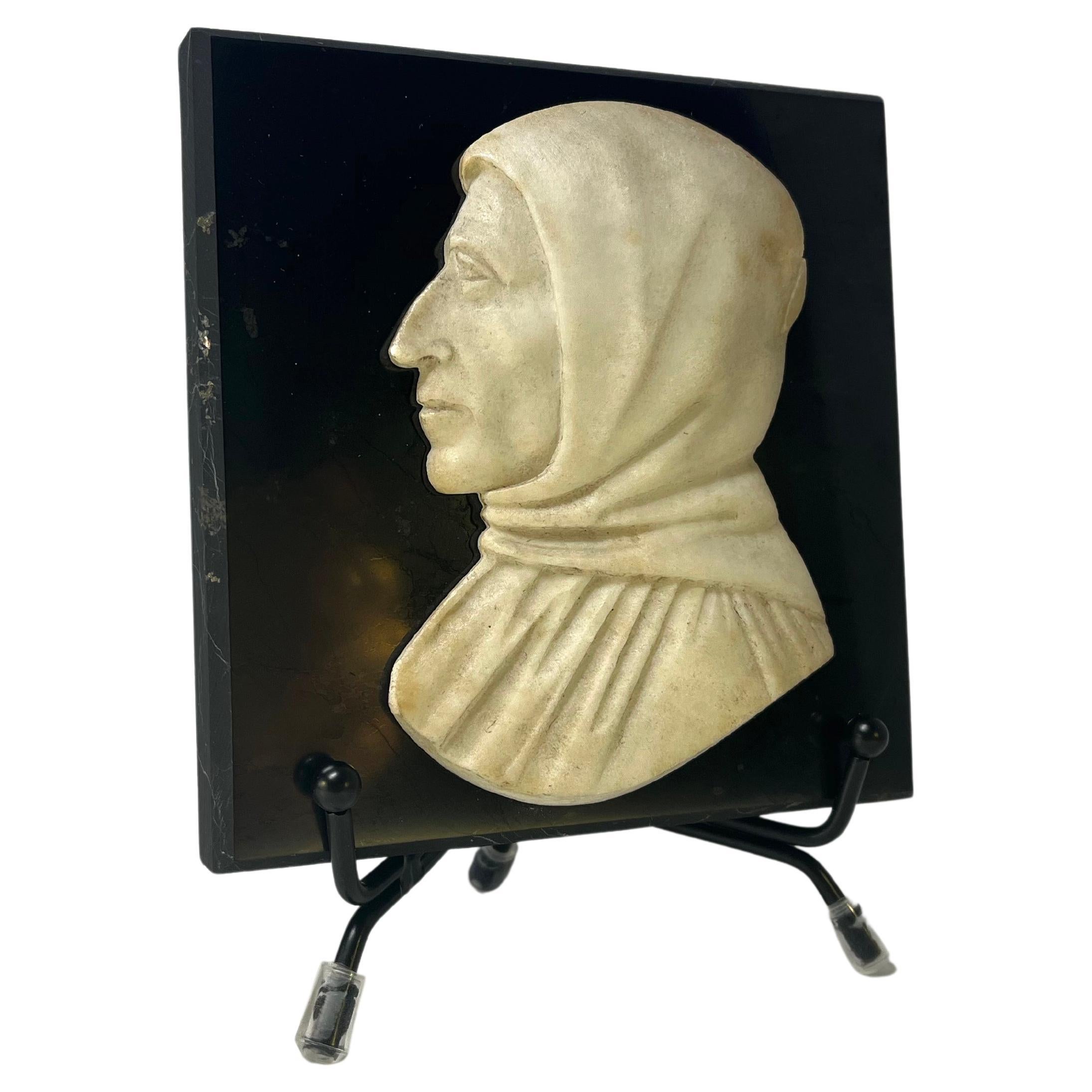 Intriguing 19th century Grand Tour carved Carrara marble cameo depicting a strong male profile, possibly the Italian poet Dante Alighieri 
Antique Italian souvenir offering fine detailing and clean lines 
Mounted on obsidian black mount
Width 4