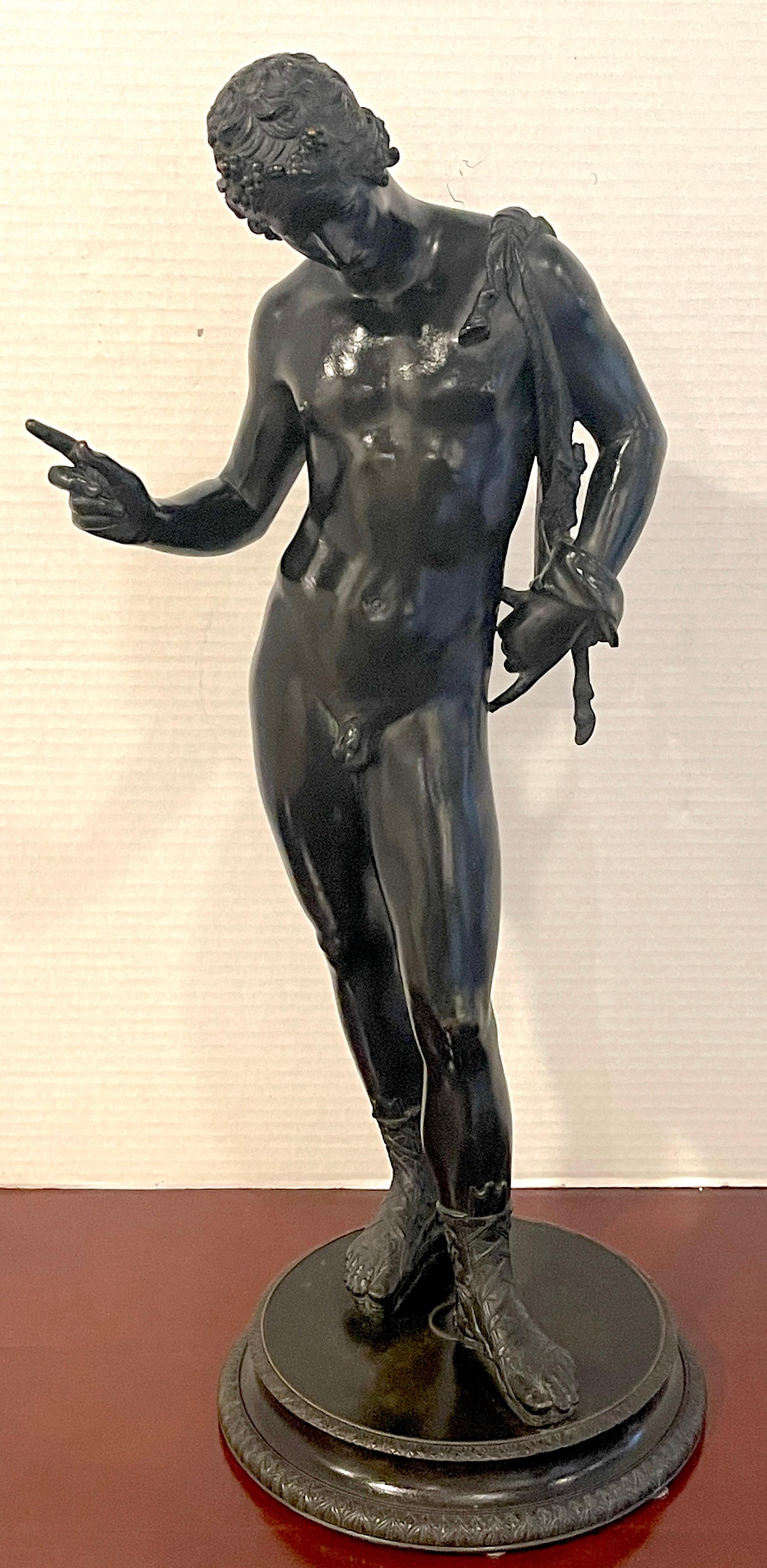 Grand tour patinated bronze figure of Narcissus, Signed, M. Amodio Napoli
A fine example of Italian 19th century grand tour. Standing 24.75-Inches high, the draped figure standing on a circular base with a leaf cast rim and foundry