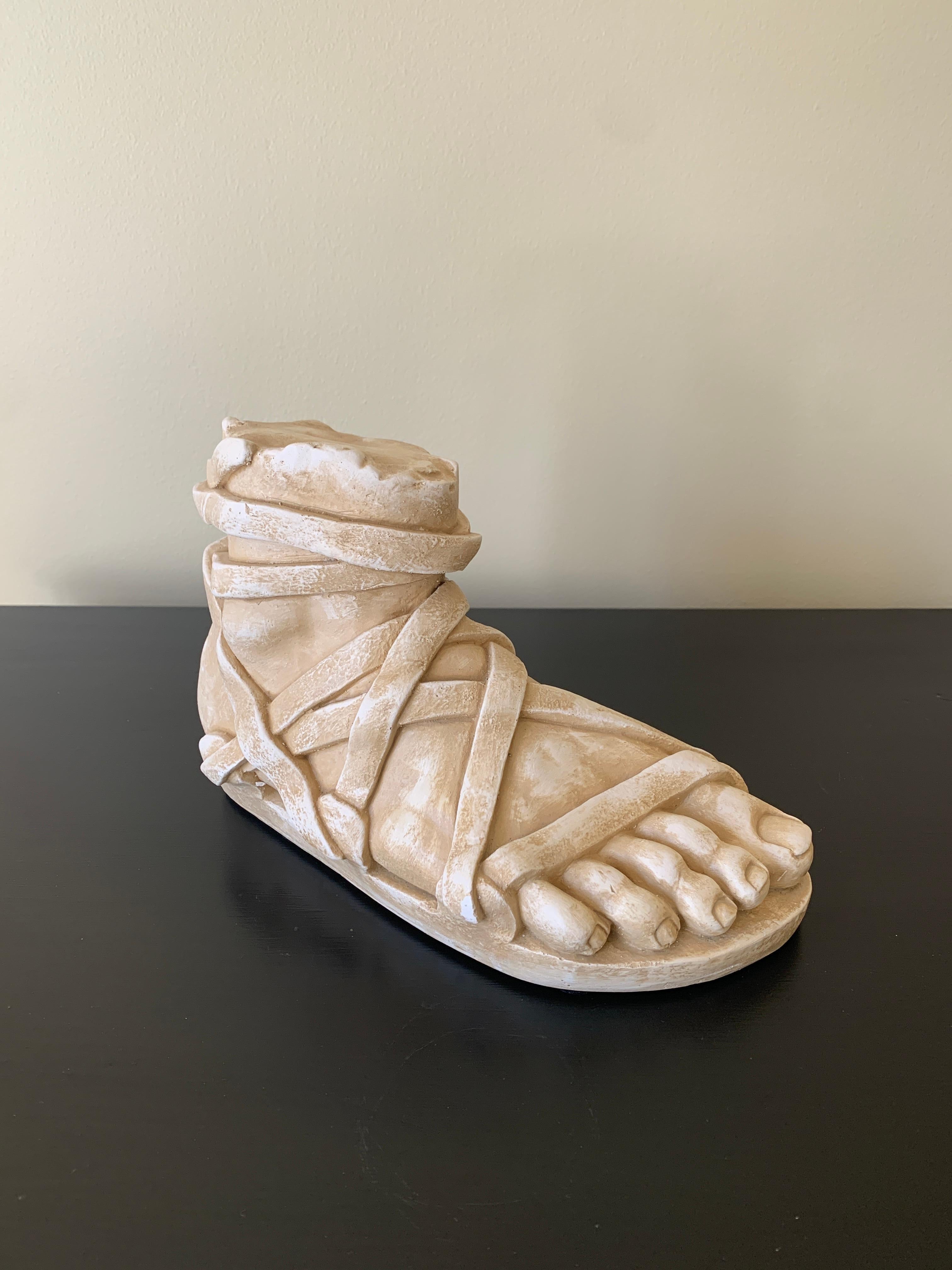 A gorgeous Grand Tour style cast plaster sculpture of an Ancient Greek or Roman foot

USA, Late 20th Century

Measures: 10