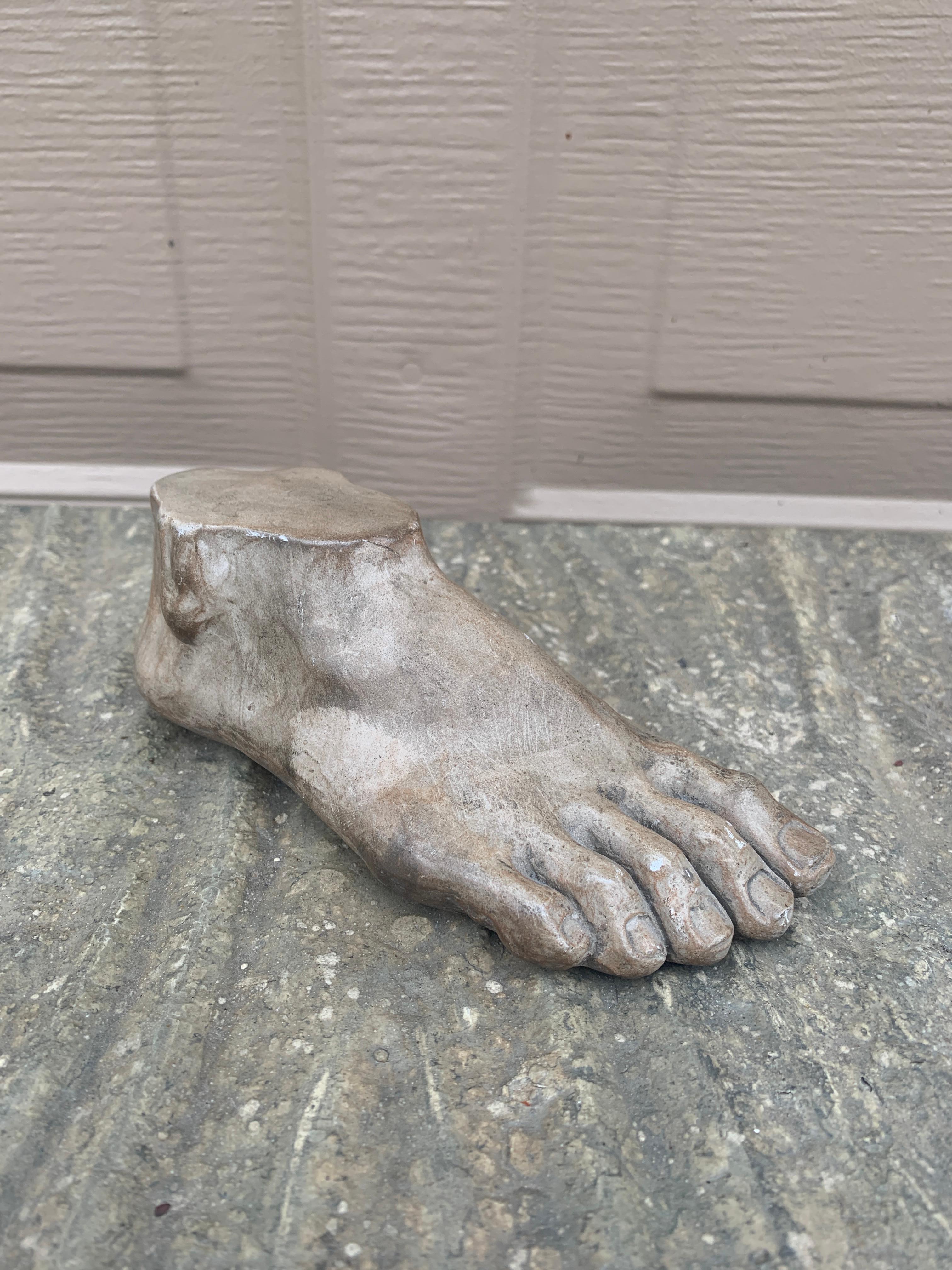 A gorgeous Grand Tour style cast plaster sculpture of an Ancient Greek or Roman foot

USA, Late 20th Century

Measures: 6.25