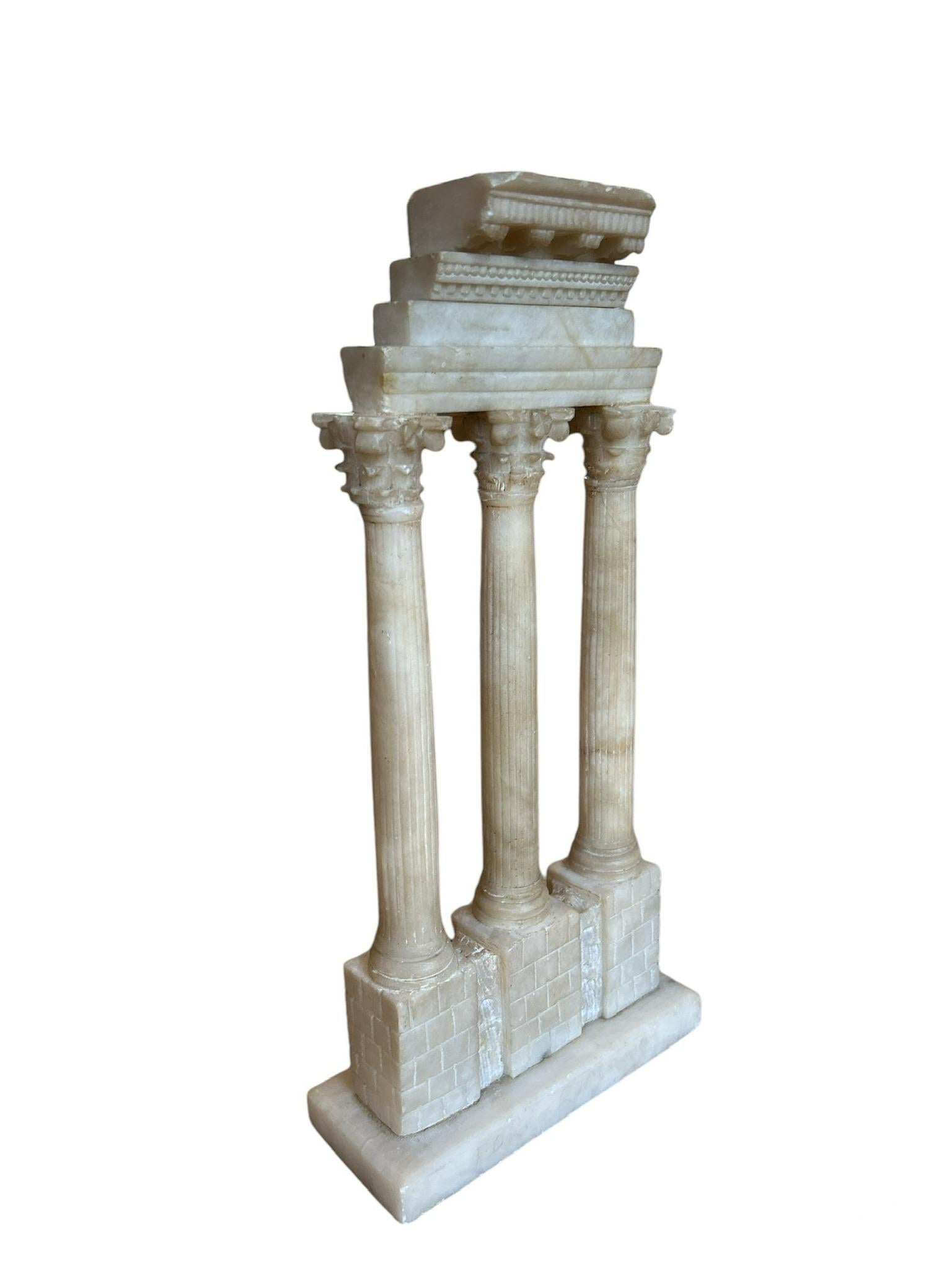 Temple of Castor & Pollux in alabaster. Grand Tour souvenir.
(Later) inscription on the base: Forum Romano.
We also have this object in bronze but slightly smaller.