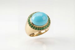 Grande bague en or jaune 18 carats avec turquoise et émeraudes