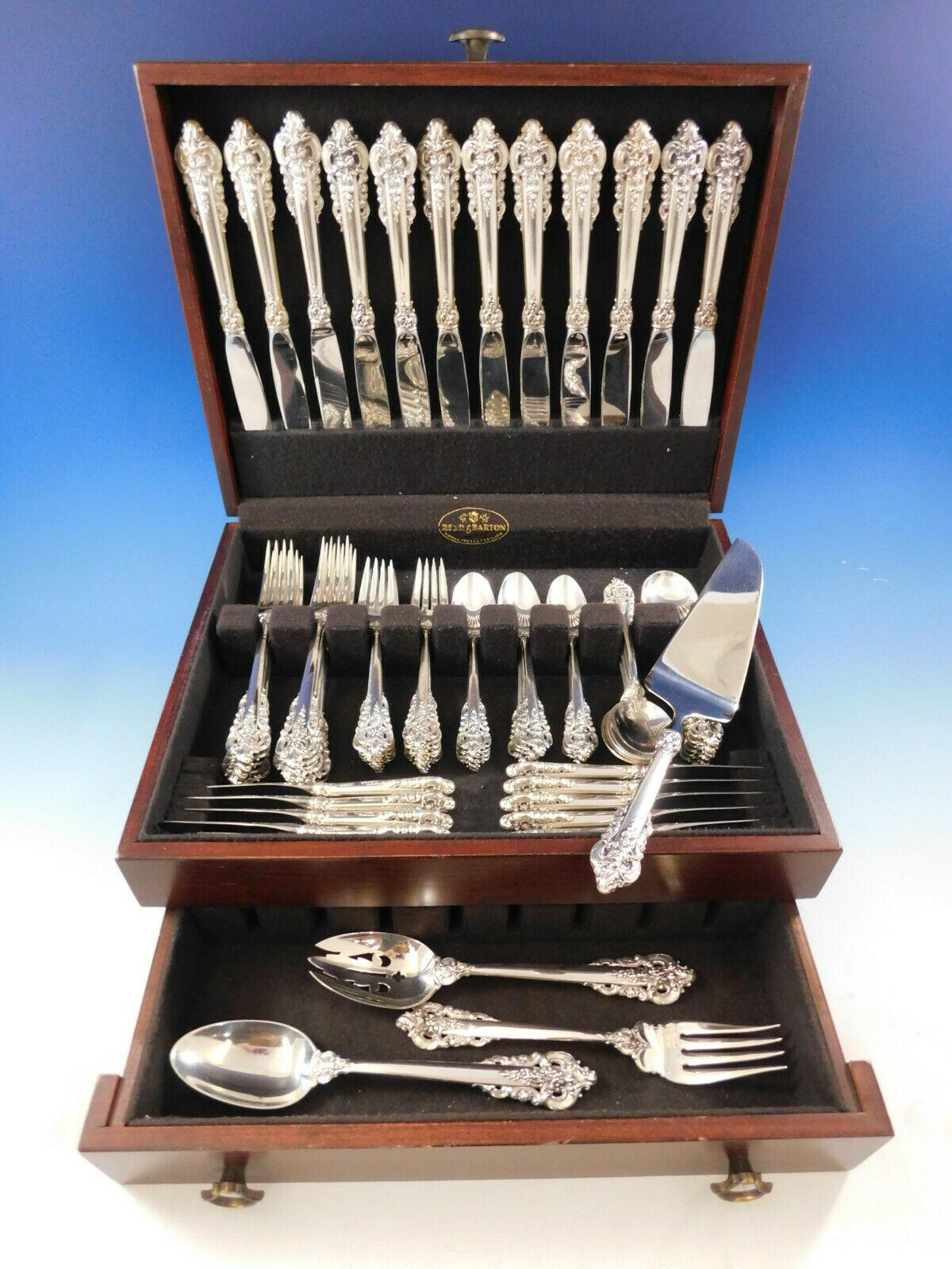 Grande Baroque by Wallace sinner size sterling silver flatware set - 76 Pieces. This set includes:

12 dinner knives, 9 3/4