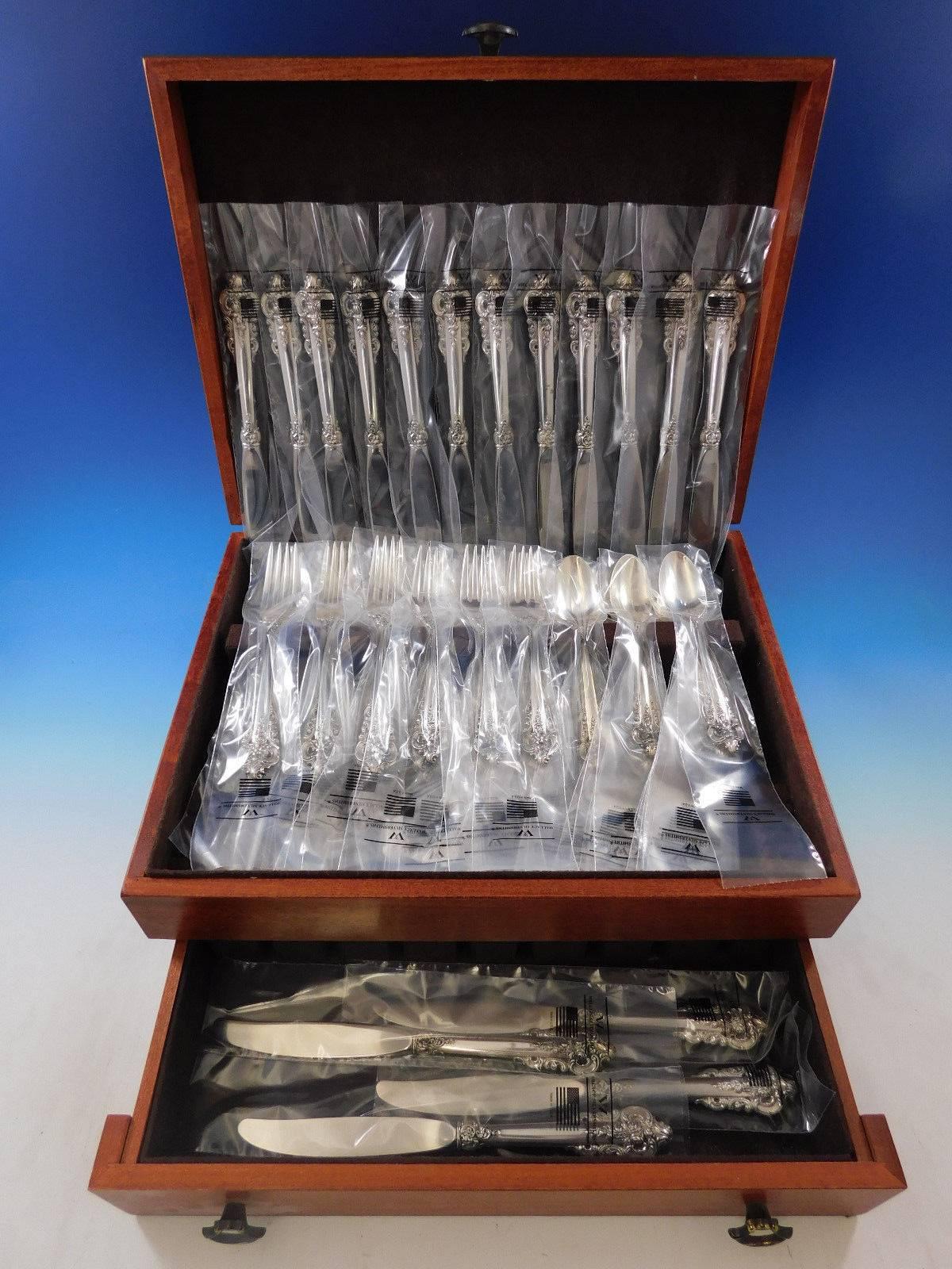 New in factory sleeves Grande Baroque by Wallace sterling silver flatware set - 72 pieces. This set includes:

18 knives, 8 7/8