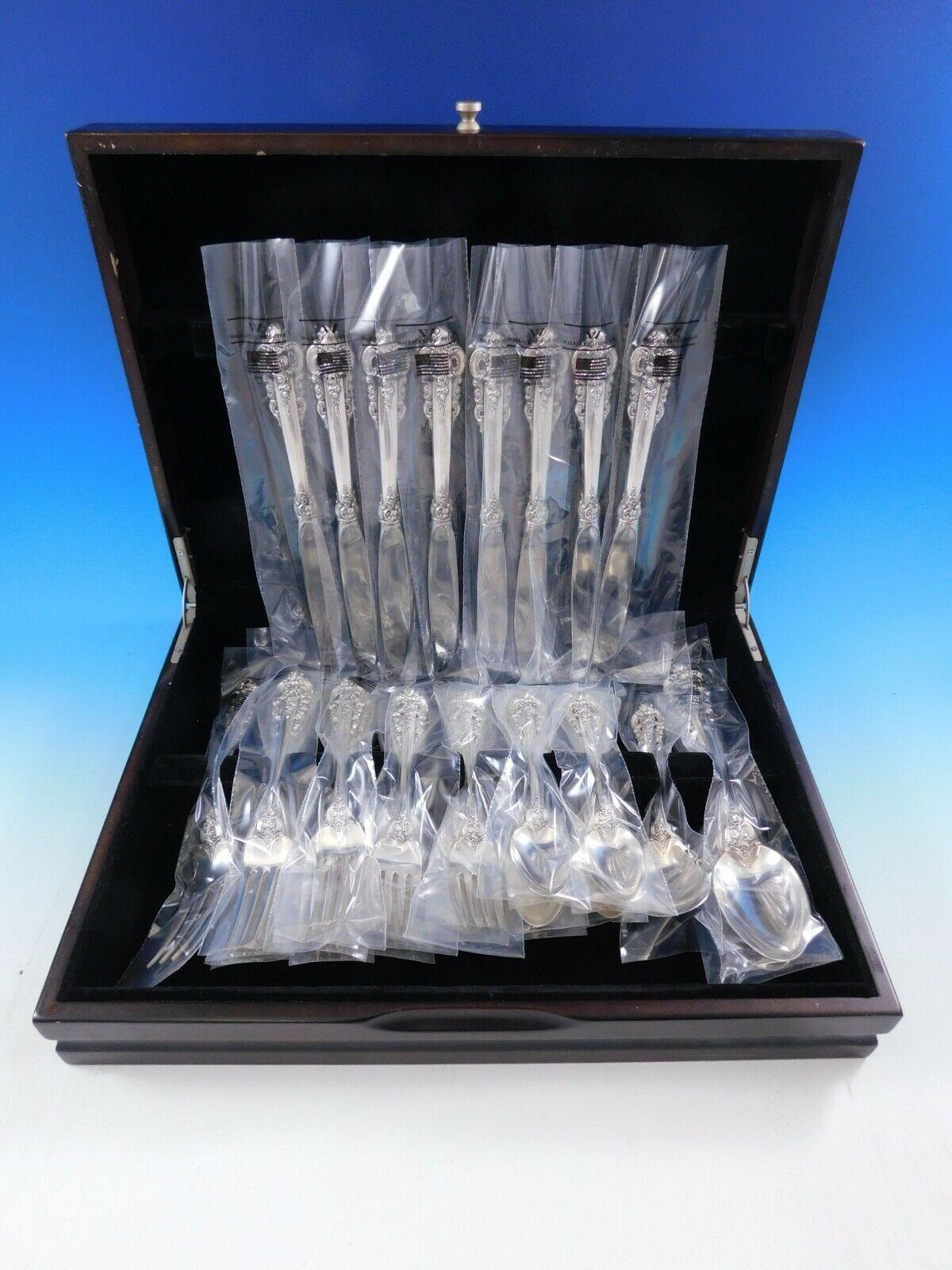 Unused Grande Baroque by Wallace sterling silver flatware set - 36 Pieces. This set includes:

8 knives, 9