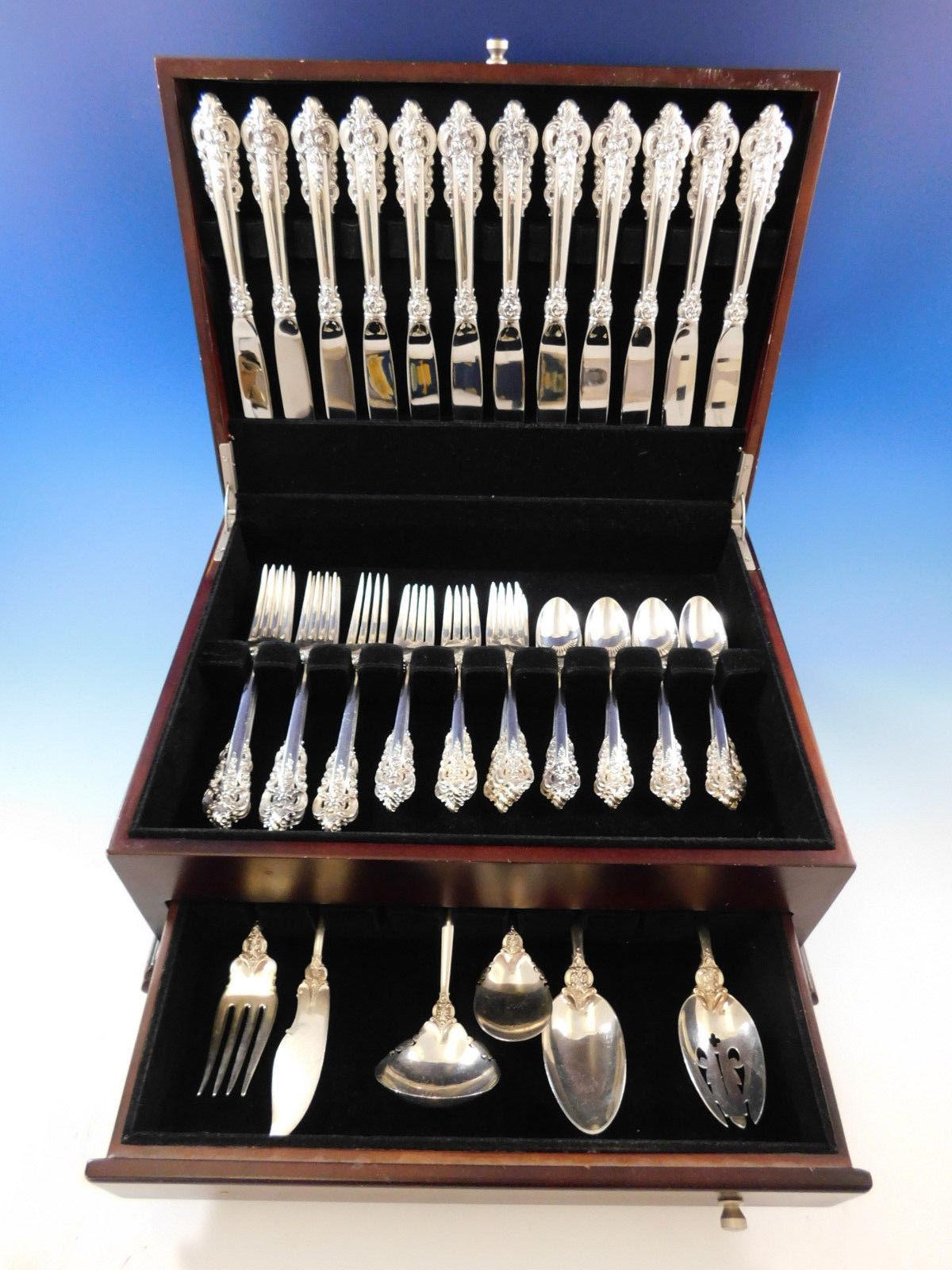 Dinner size grande baroque by Wallace sterling silver flatware set - 54 Pieces. This set includes:

12 dinner size knives, 9 3/4