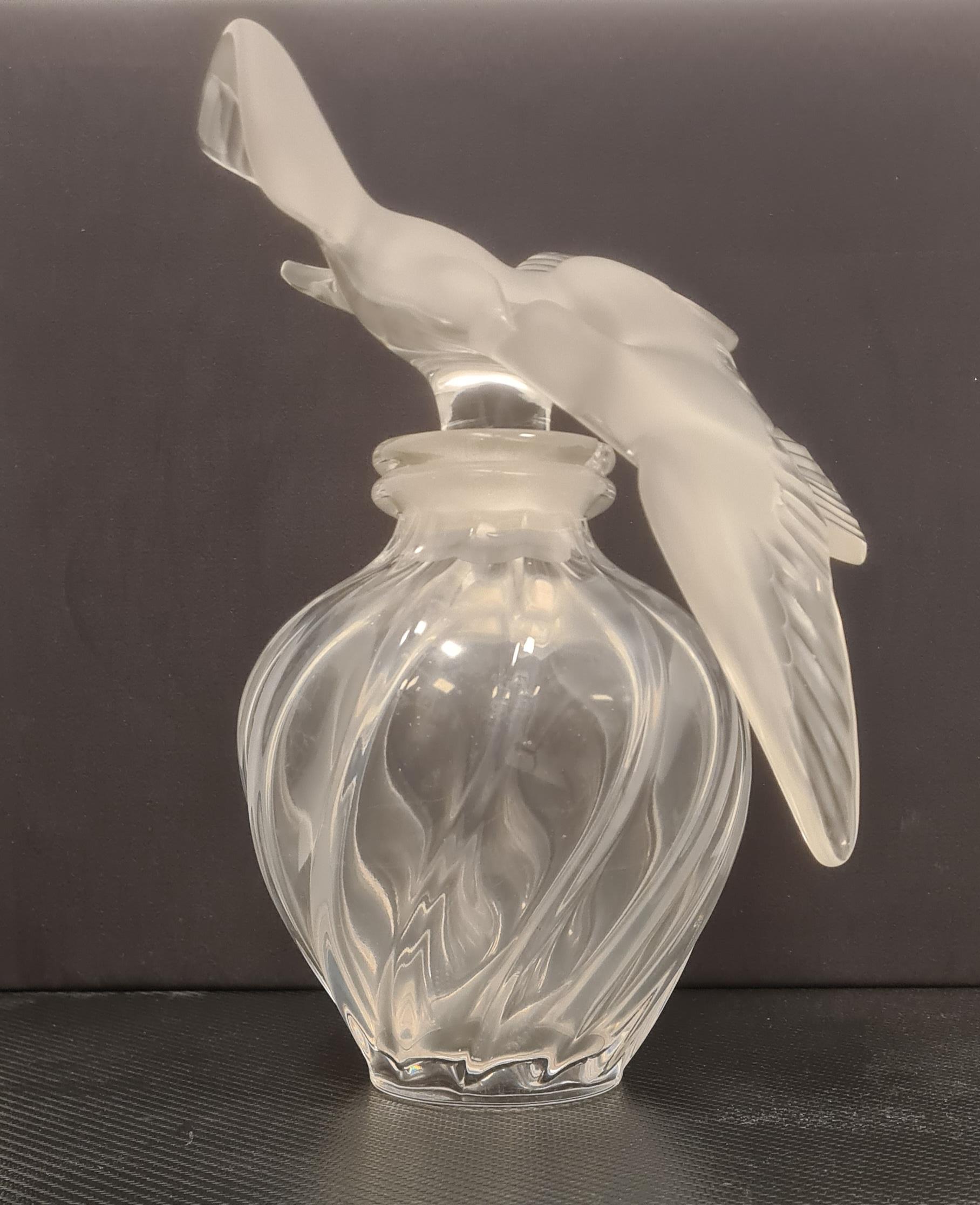 Mid-20th Century Large collectible Lalique glass bottle of the perfume L'air du temps For Sale