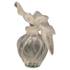 Large collectible Lalique glass bottle of the perfume L'air du temps