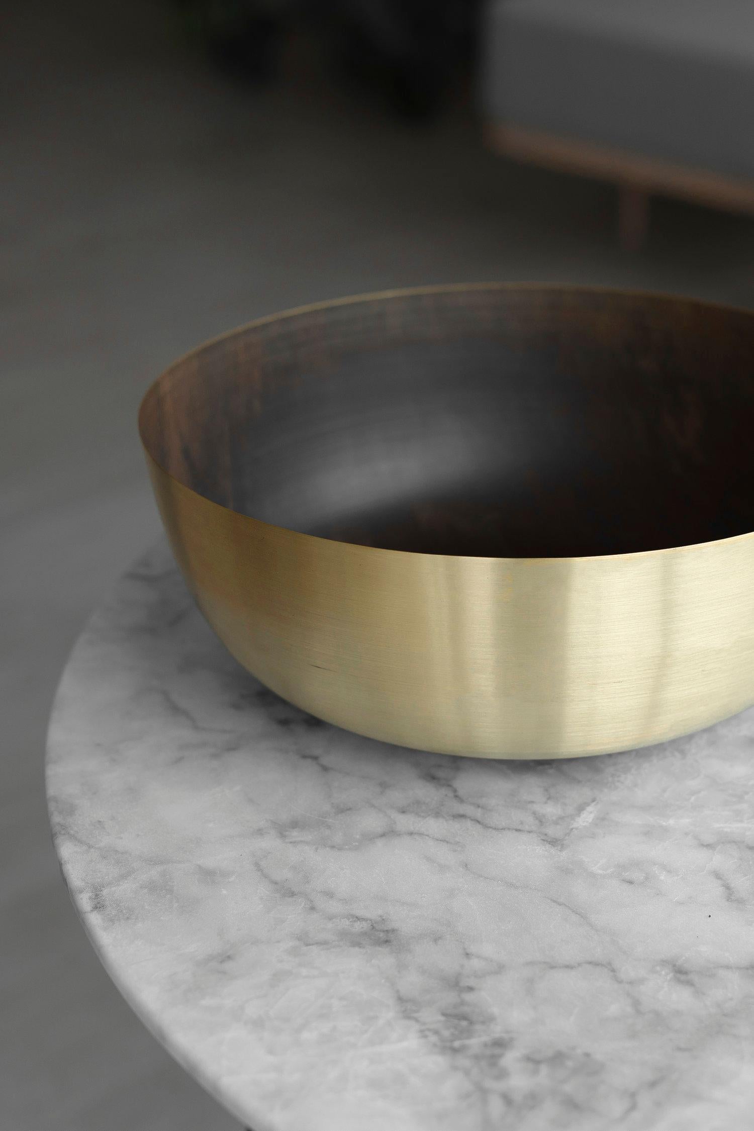 Hand Spun Brass Centerpiece Bowl

This large brass bowl makes a bold statement. Perfect for a large space and a long dinner table, this handmade artisanal bowl is the perfect minimalist centerpiece to draw the eye. A large bowl like this one works