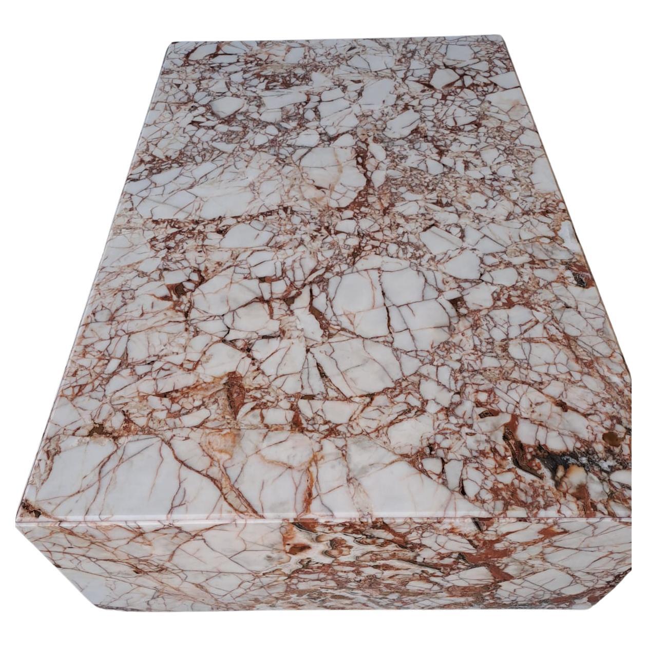 Introducing a masterpiece of design and nature's beauty, our Calacatta Viola Marble Coffee Table is a true testament to elegance and craftsmanship. This exquisite table effortlessly combines the serene purity of Calacatta Viola marble with a unique