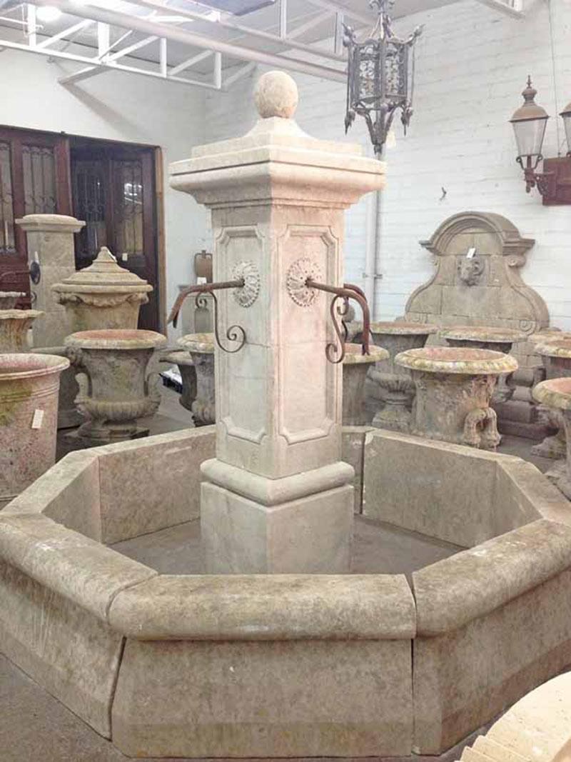 Here we have a very grand hand craved limestone central fountain from France. This fountain has 4 spouts and flower motif carvings on each side of the column.

Origin: France

Measurements: 7'4