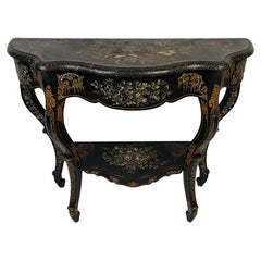 Grande console Napoléon III, bois noirci à riche décor peint et burgauté