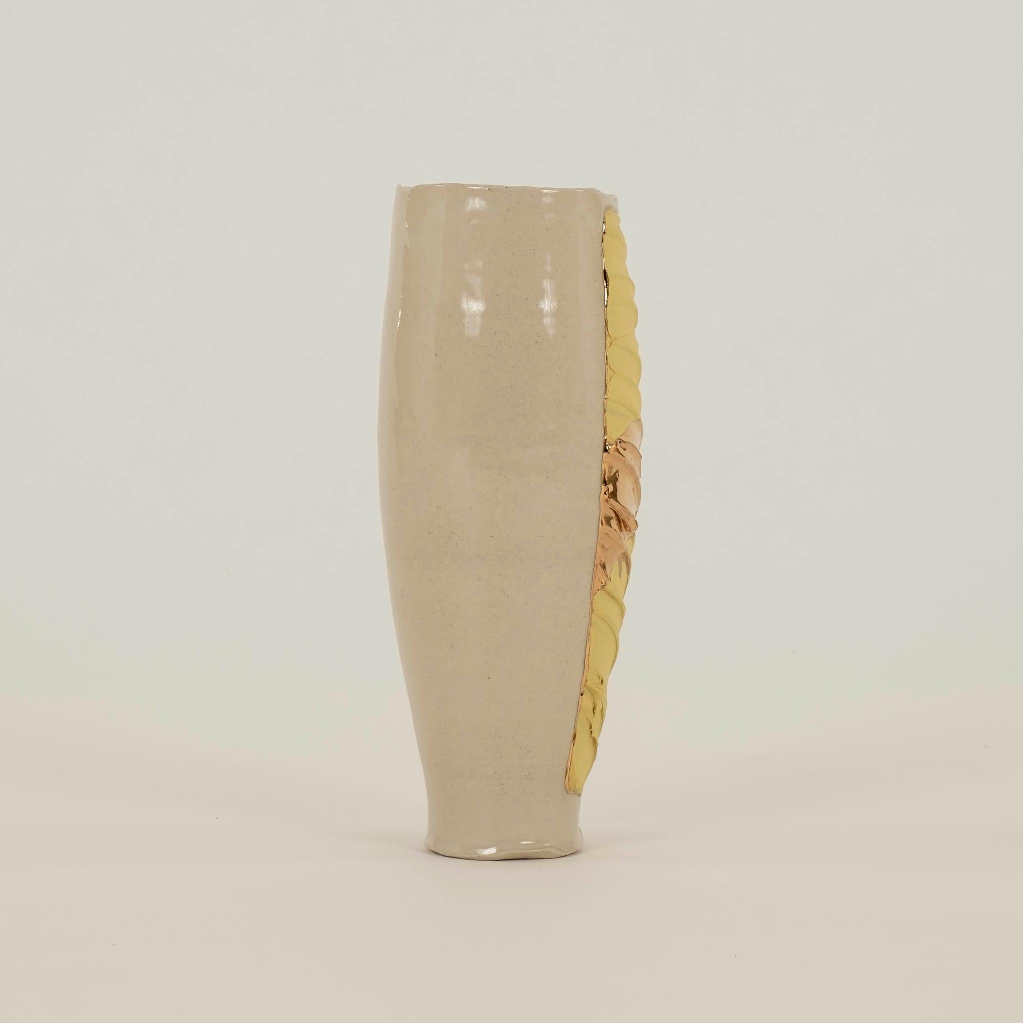 Hand thrown porcelain vase with polychrome and 24K fire gilt accents.
North America, 21st C
Chase Gamblin

Chase Gamblin is an artist primarily working in ceramics. Currently, he is an Academic Specialist and Studio Coordinator for the Ceramics