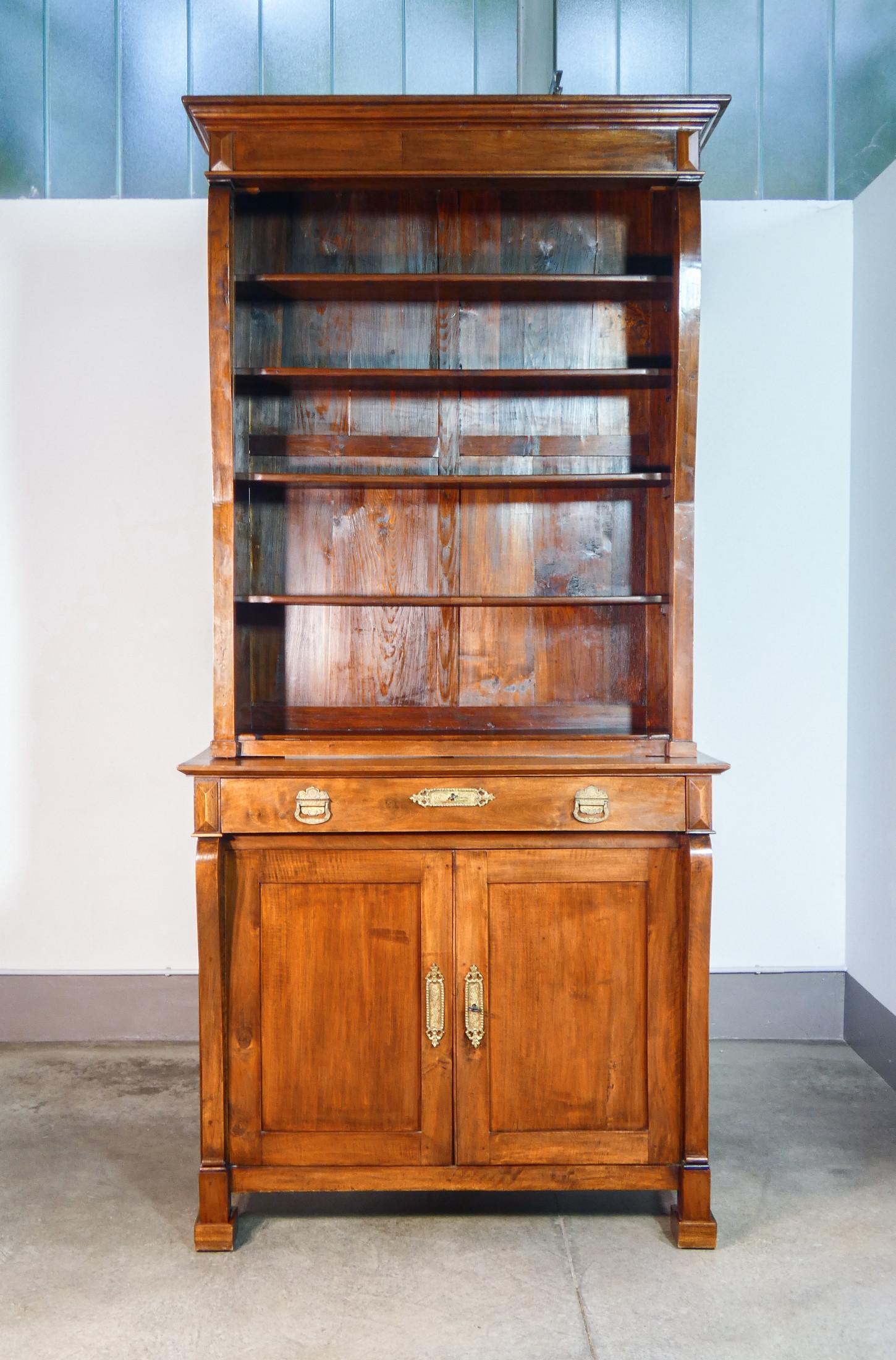 19th Century Large Empire-style sideboard bookcase made of solid walnut wood. Early 19th century For Sale