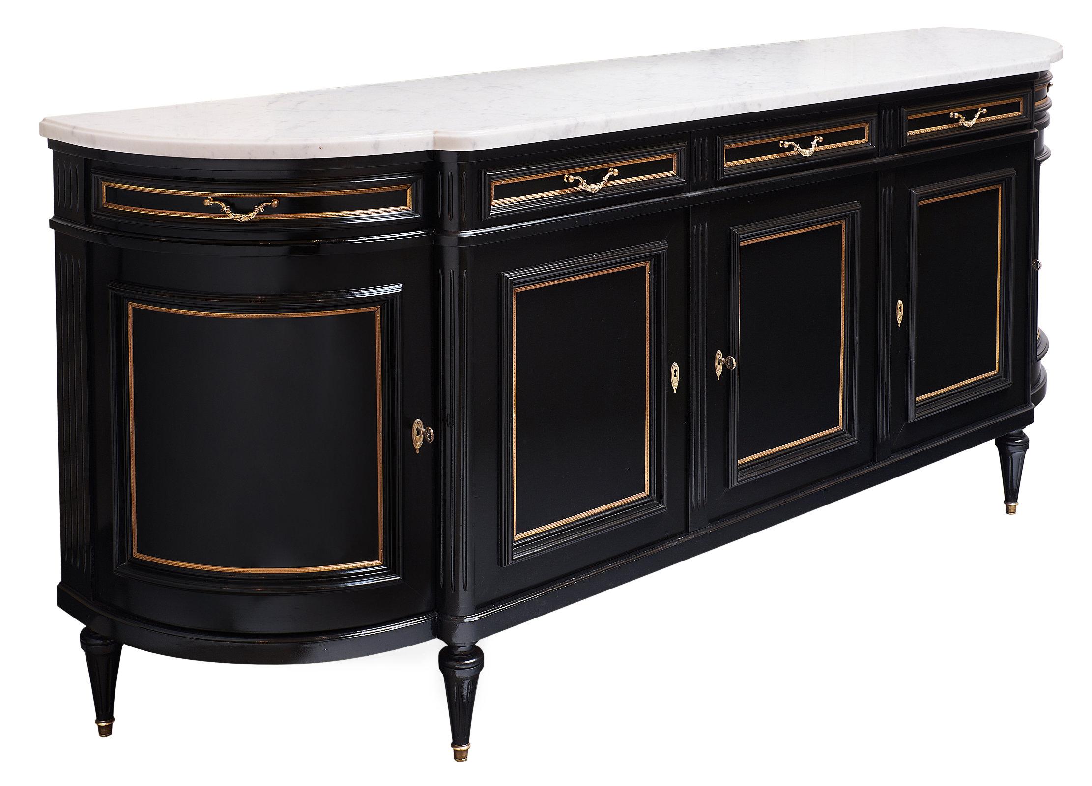 Beautiful French antique grande Louis XVI style buffet made of mahogany and featuring original brass hardware and trim. We love the intact Carrara marble top which adds elegance and a classic touch. This piece has been ebonized and finished with a