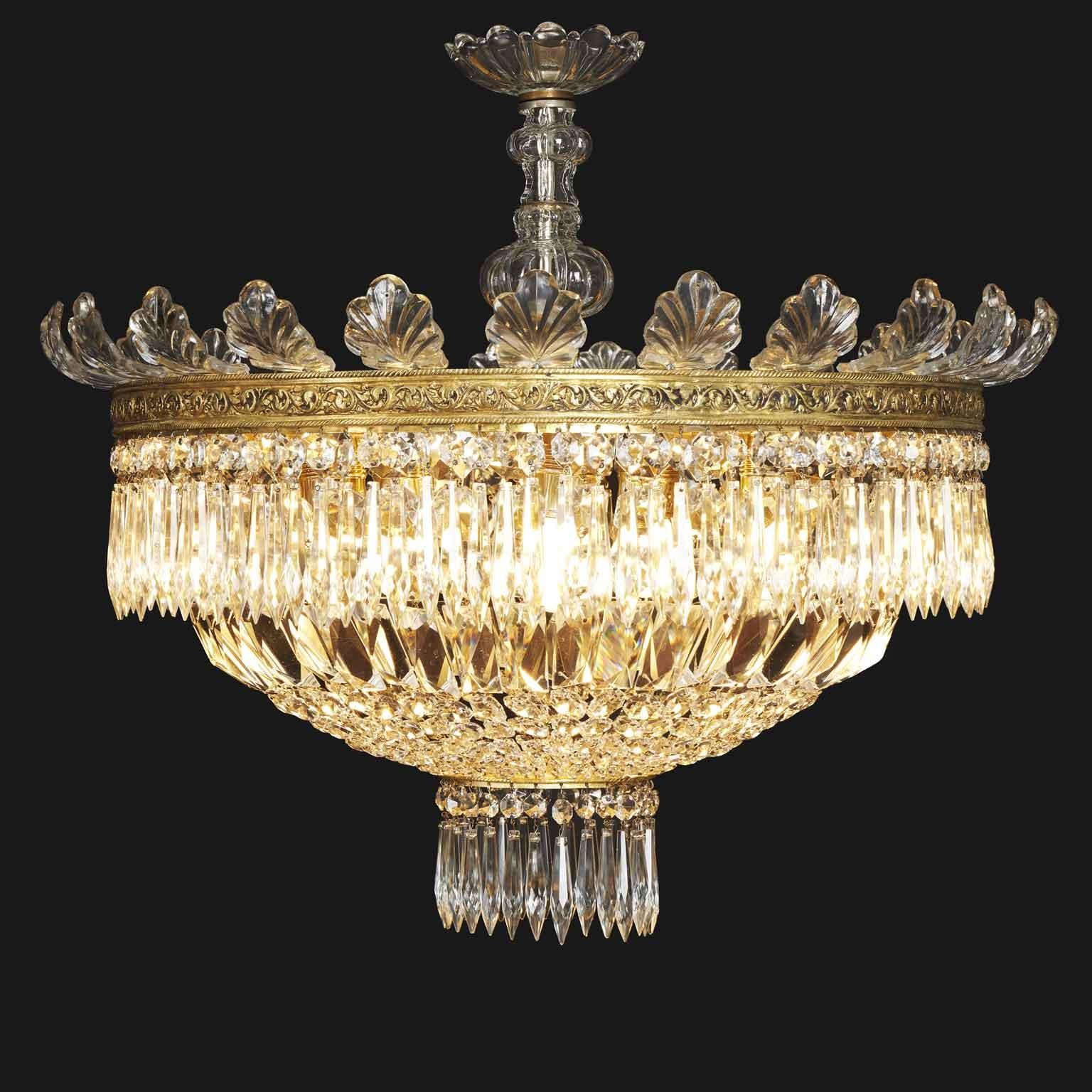 Large Crystal Ceiling Lamp with Five Fifties Lights enclosed within a circular crystal bowl. This circular suspension from the late 1950s  is characterized at the top  by a gilded crown made of cast bronze, decorated with volutes of raised racemes