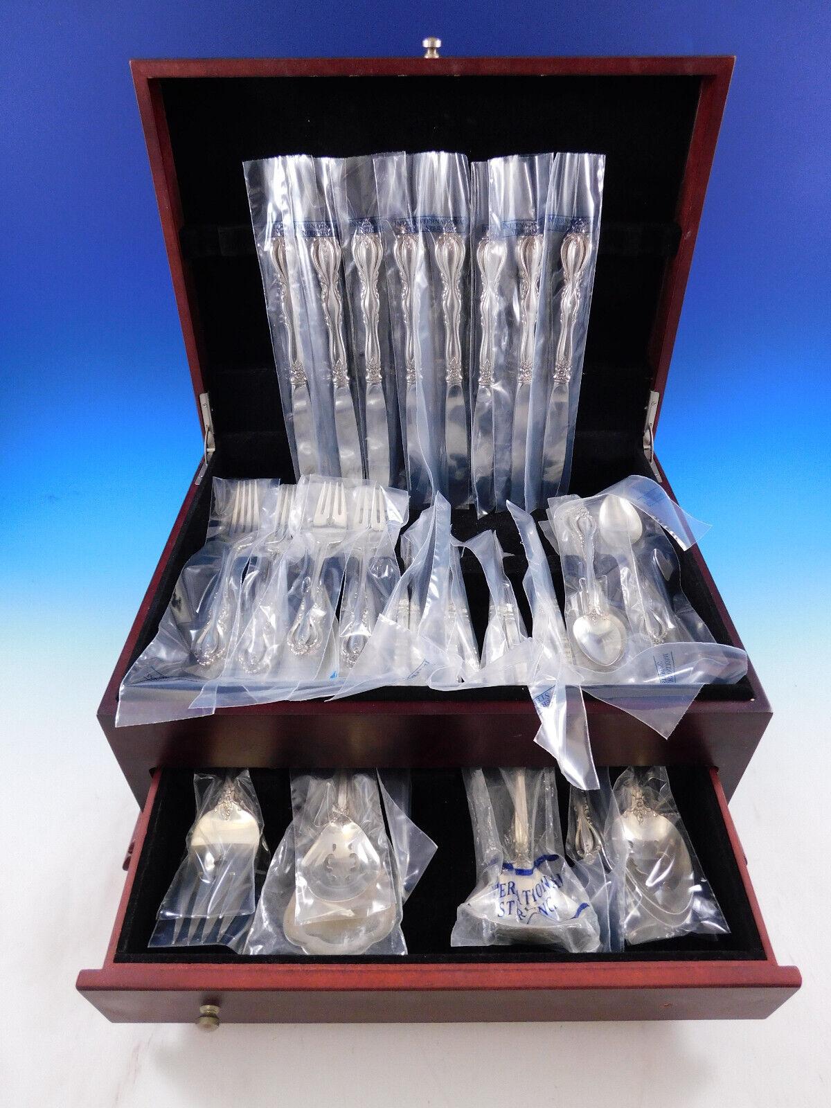 Unused Grande Regency by International sterling silver Flatware set, 50 pieces. This set includes:

8 Knives, 9