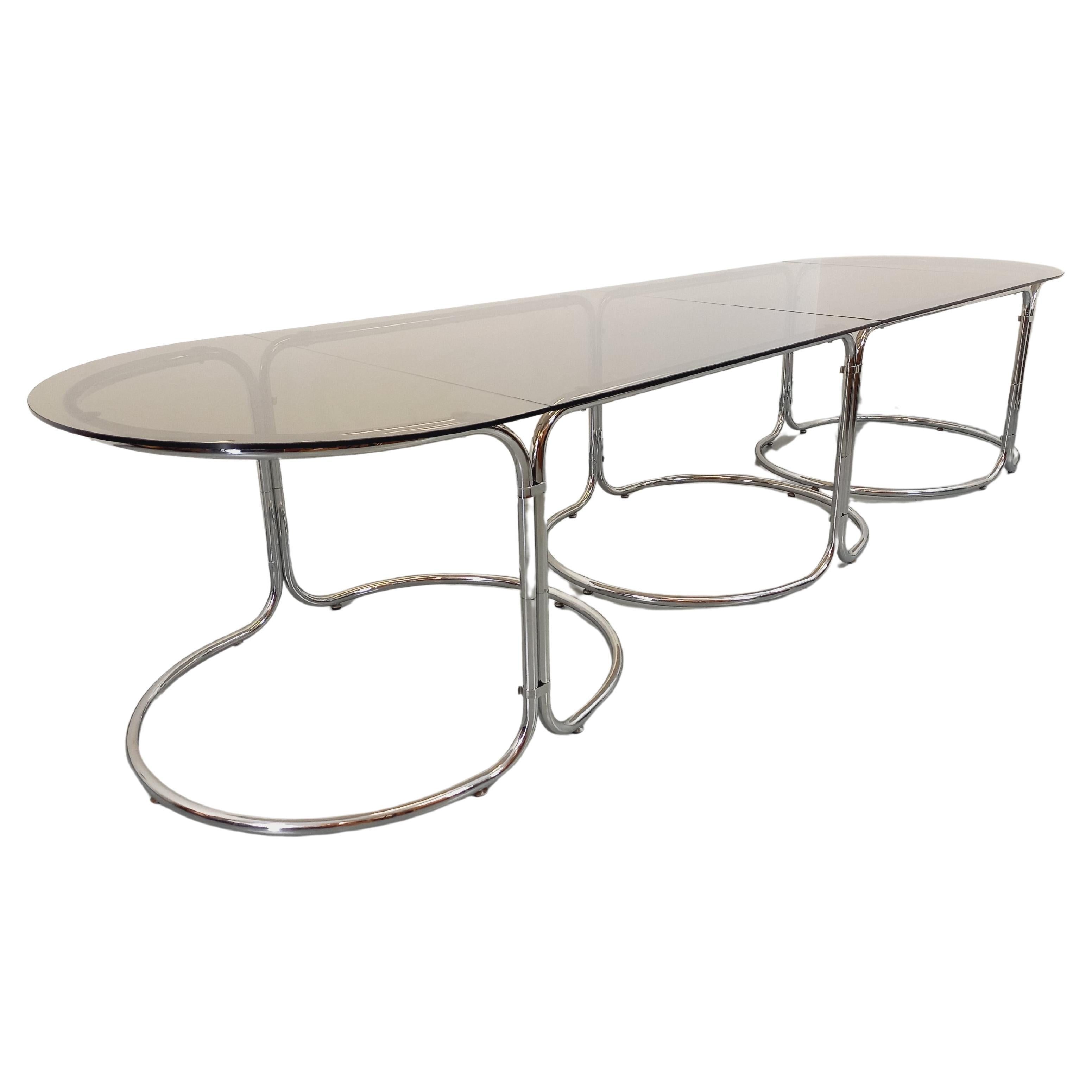 Grande table à manger ovale modulable vintage en verre fumé et métal chromé
