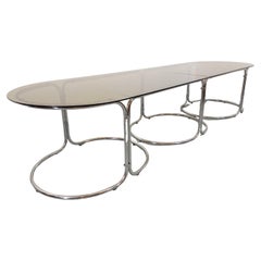 Grande table à manger ovale modulable vintage en verre fumé et métal chromé