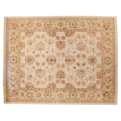 Large cream background rug with the patterns of ancient Agra
