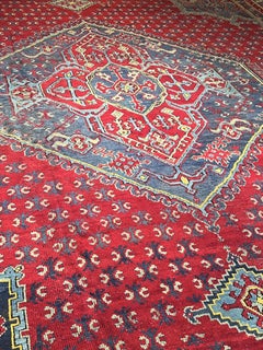 Grande tappeto Ushak fondo rosso con medaglione