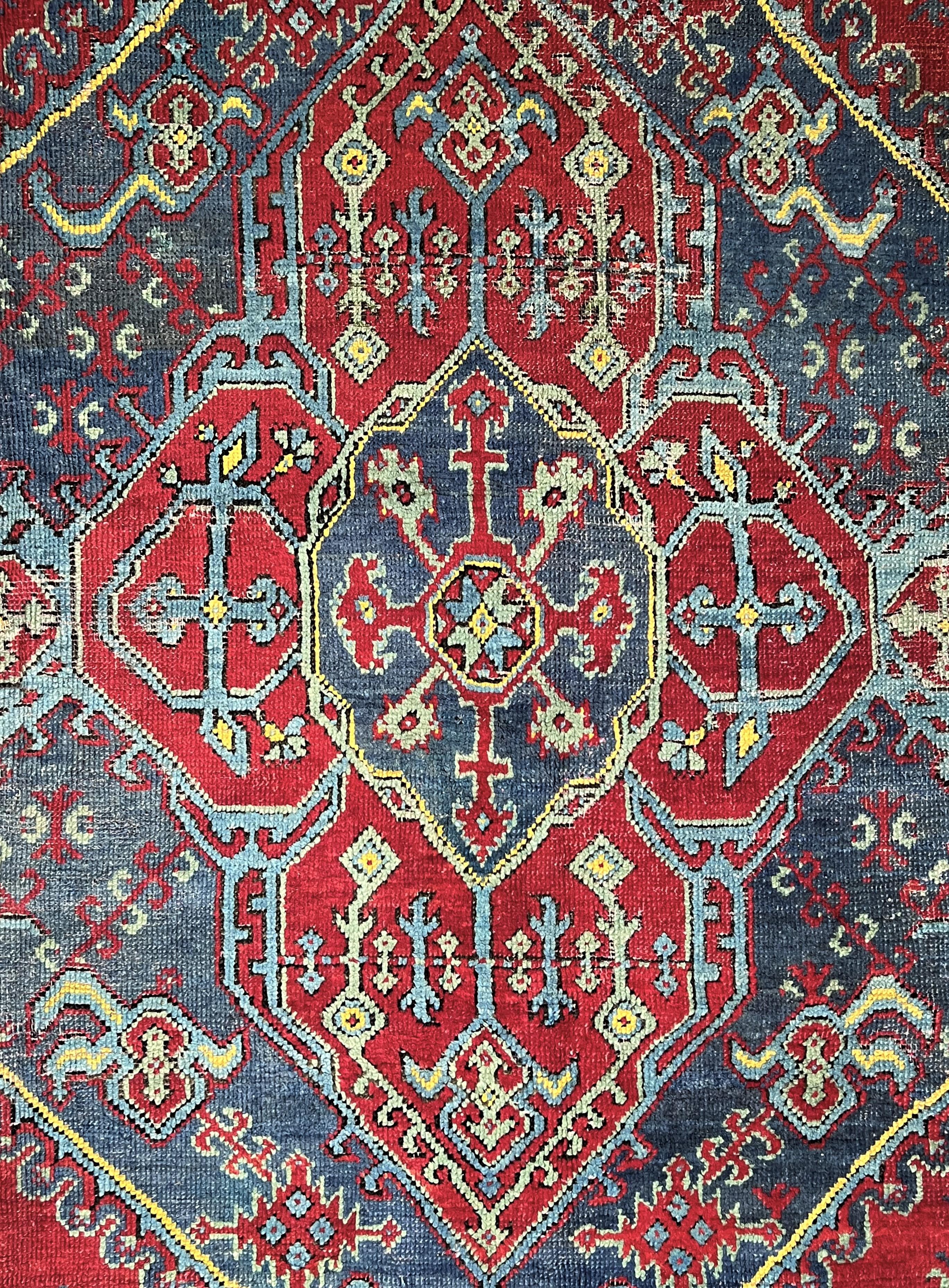 19th Century Grande tappeto Ushak fondo rosso con medaglione For Sale