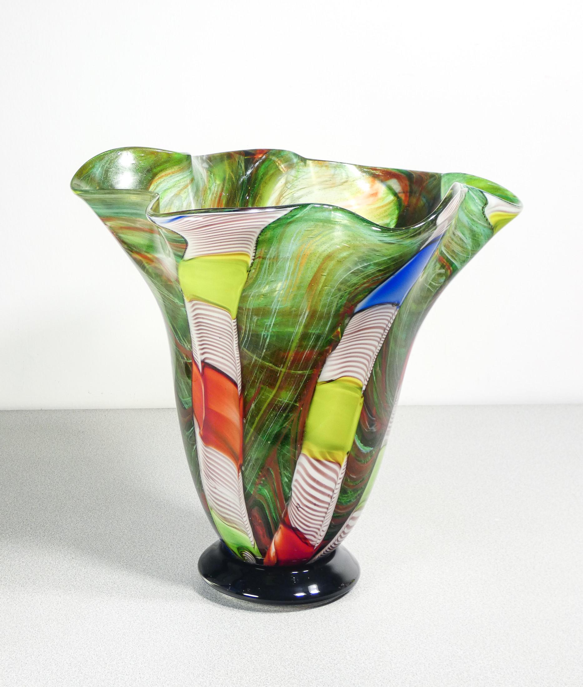 Large vase, bowl
blown glass
murano polychrome,
signed on the bottom.

ORIGIN
Murano

PERIOD
Anni 60

AUTHOR
The vase is signed at the base

MATERIALS
Blown glass
polychrome Murano

DIMENSIONS
Ø 37 cm
H 36 cm

CONDITIONS
Perfette. Evaluate through